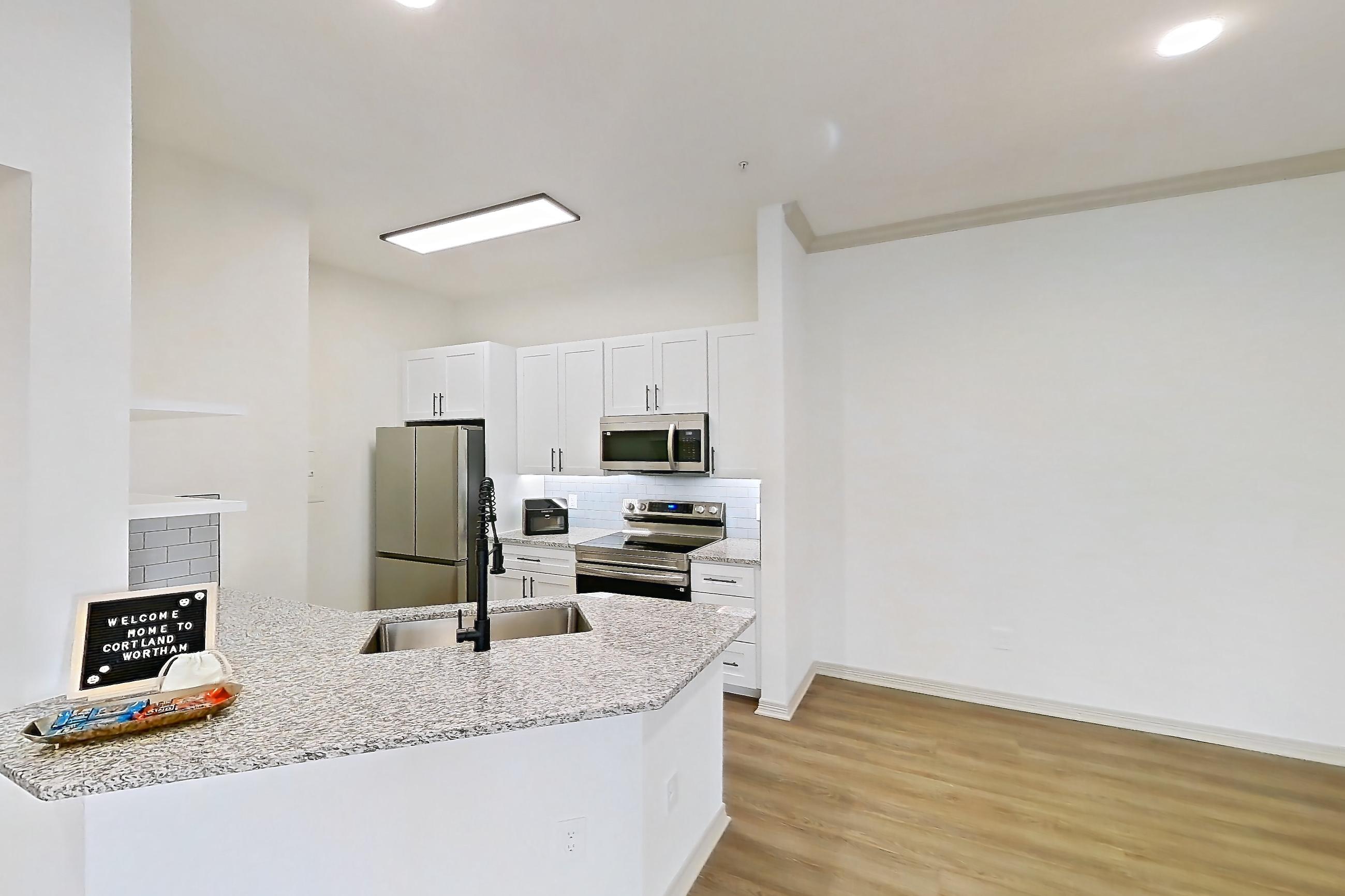 Living space in Apartment 16210 at Cortland Wortham, B3R - Windermere floor plan