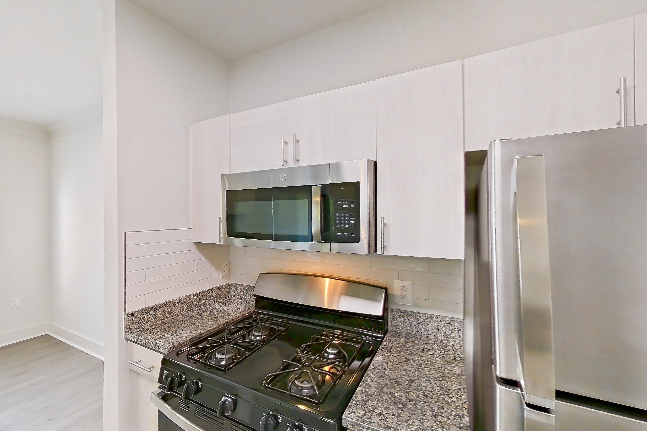 Kitchen in a B5R - Olympic floor plan apartment, representative of Apartment 600-B at Cortland at Dulles