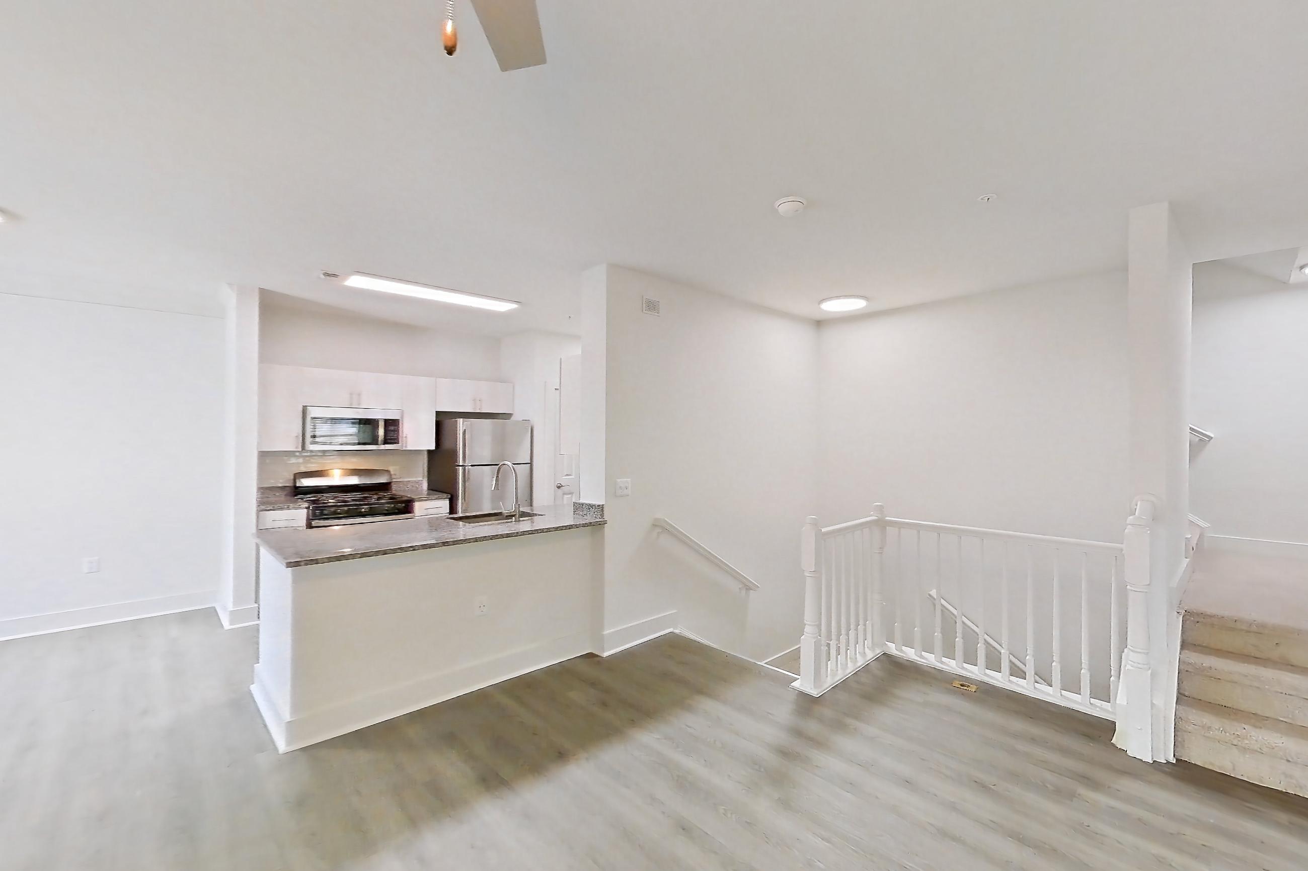 Living room in a B5R - Olympic floor plan apartment, representative of Apartment 600-B at Cortland at Dulles