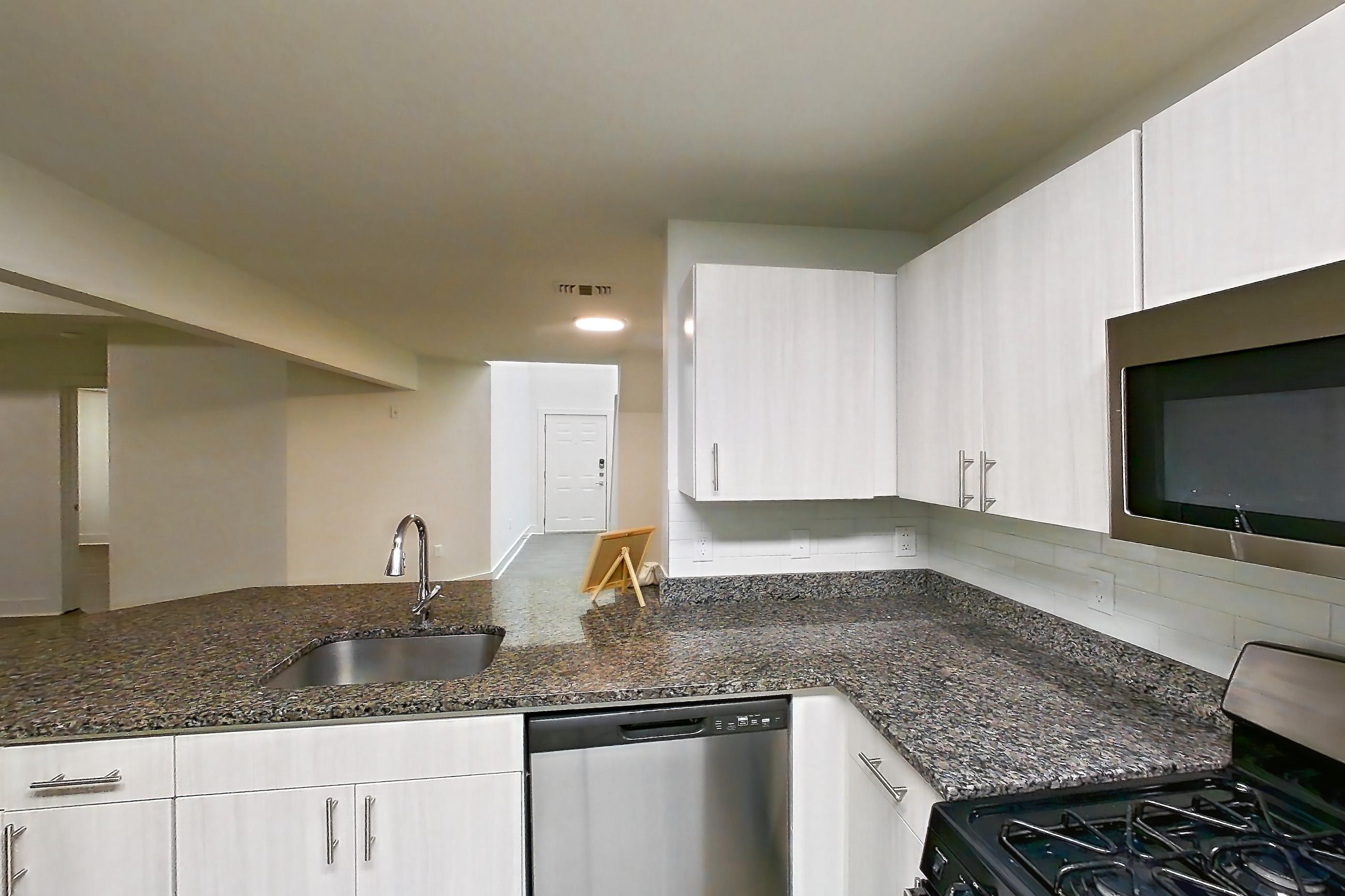 Kitchen in Apartment 673-n at Cortland at Dulles, B6R - Rainier floor plan