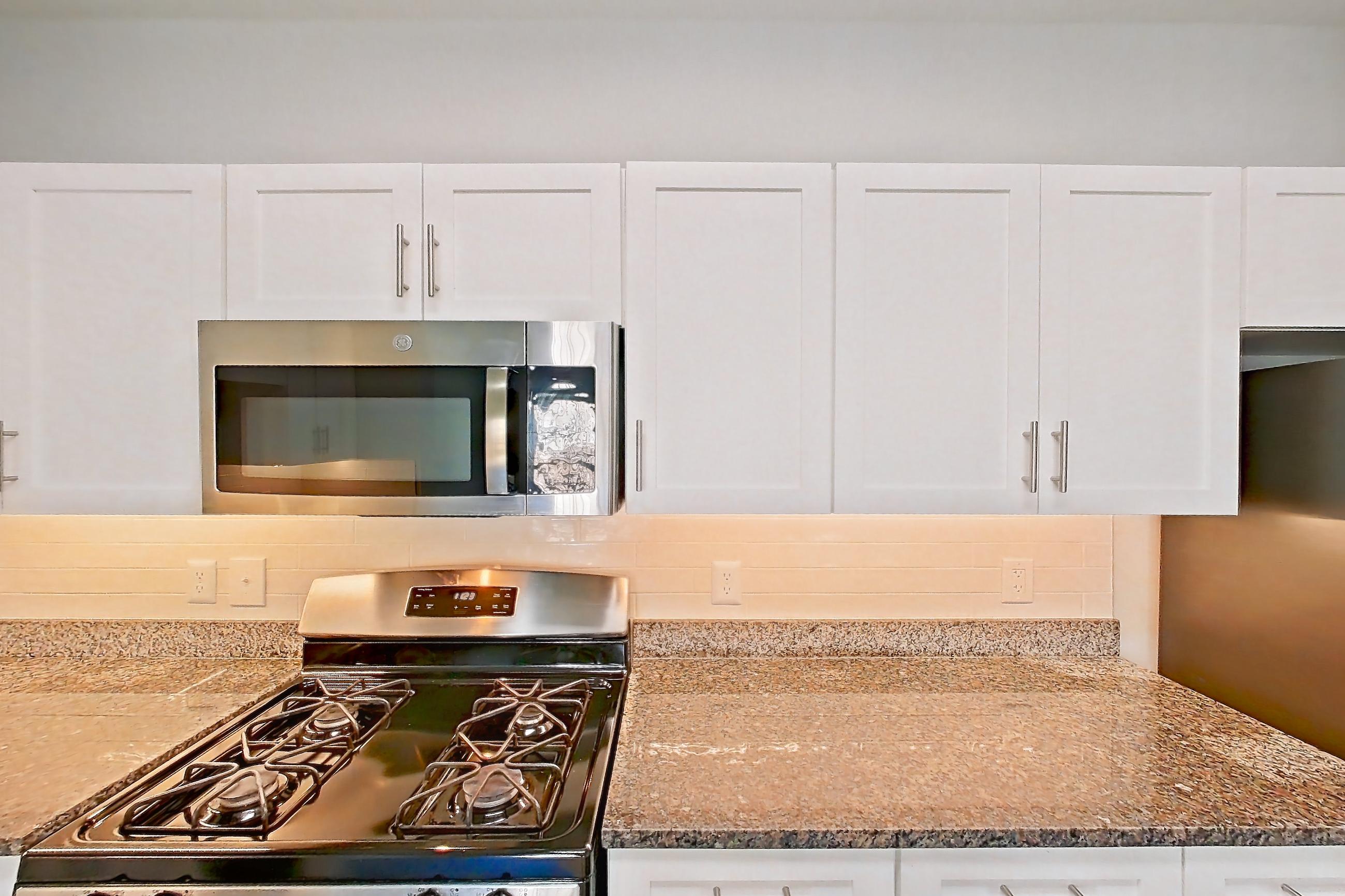 Kitchen in Apartment 647-a at Cortland at Dulles, B7R - Rocky floor plan