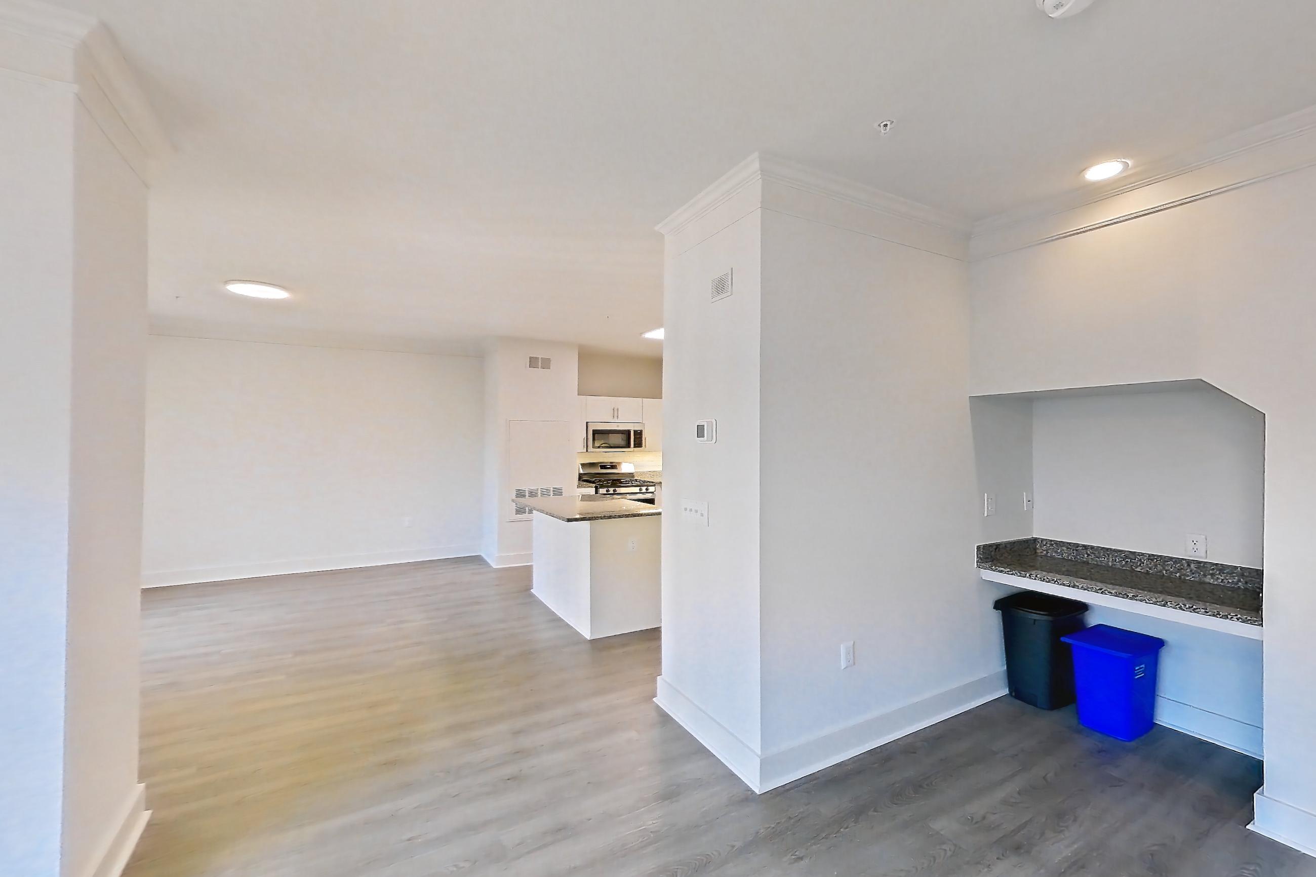 Living room in Apartment 650-c at Cortland at Dulles, B8R - Teton floor plan