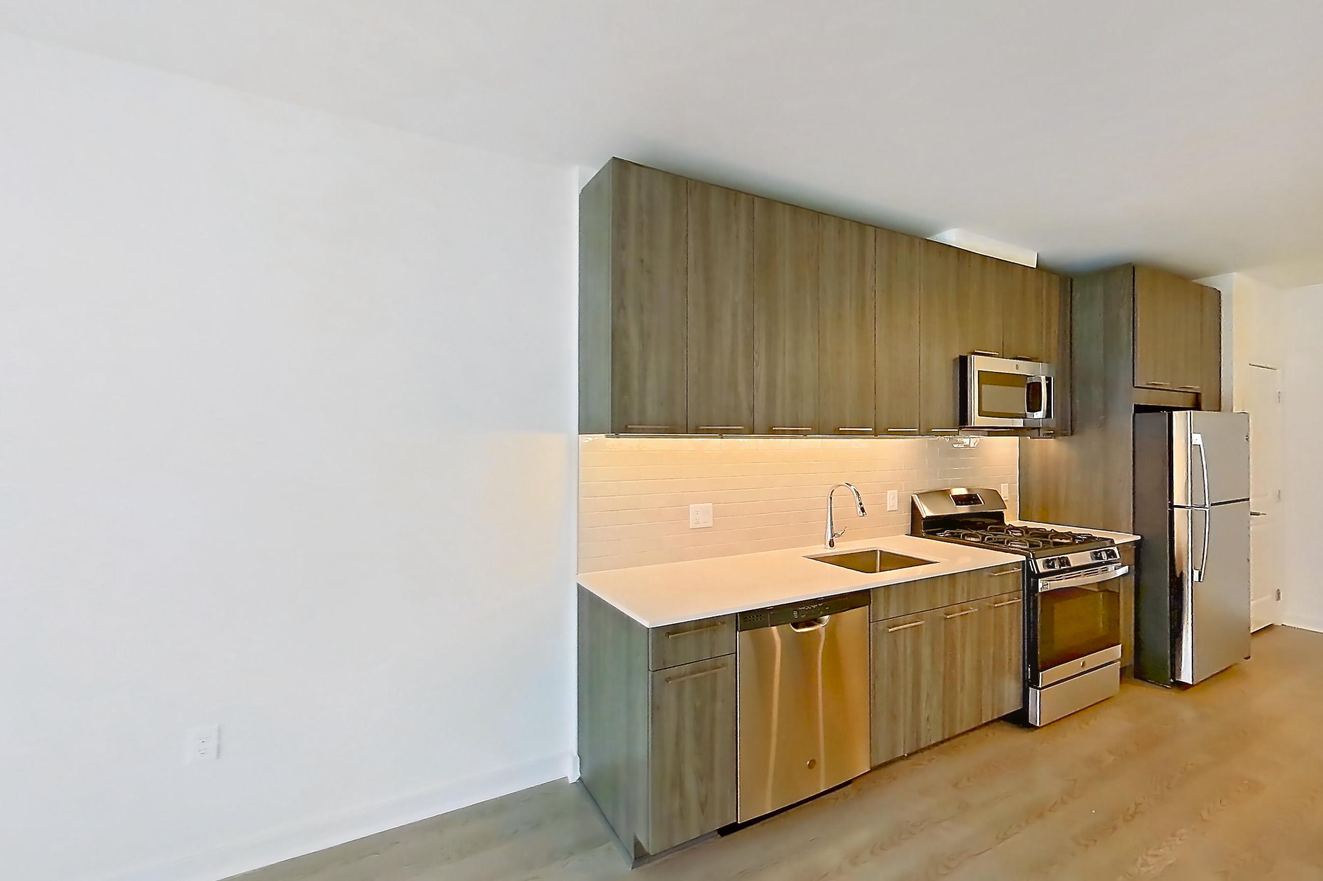 Living room in a A23 floor plan apartment, representative of Apartment 342 at Cortland Columbia Pike