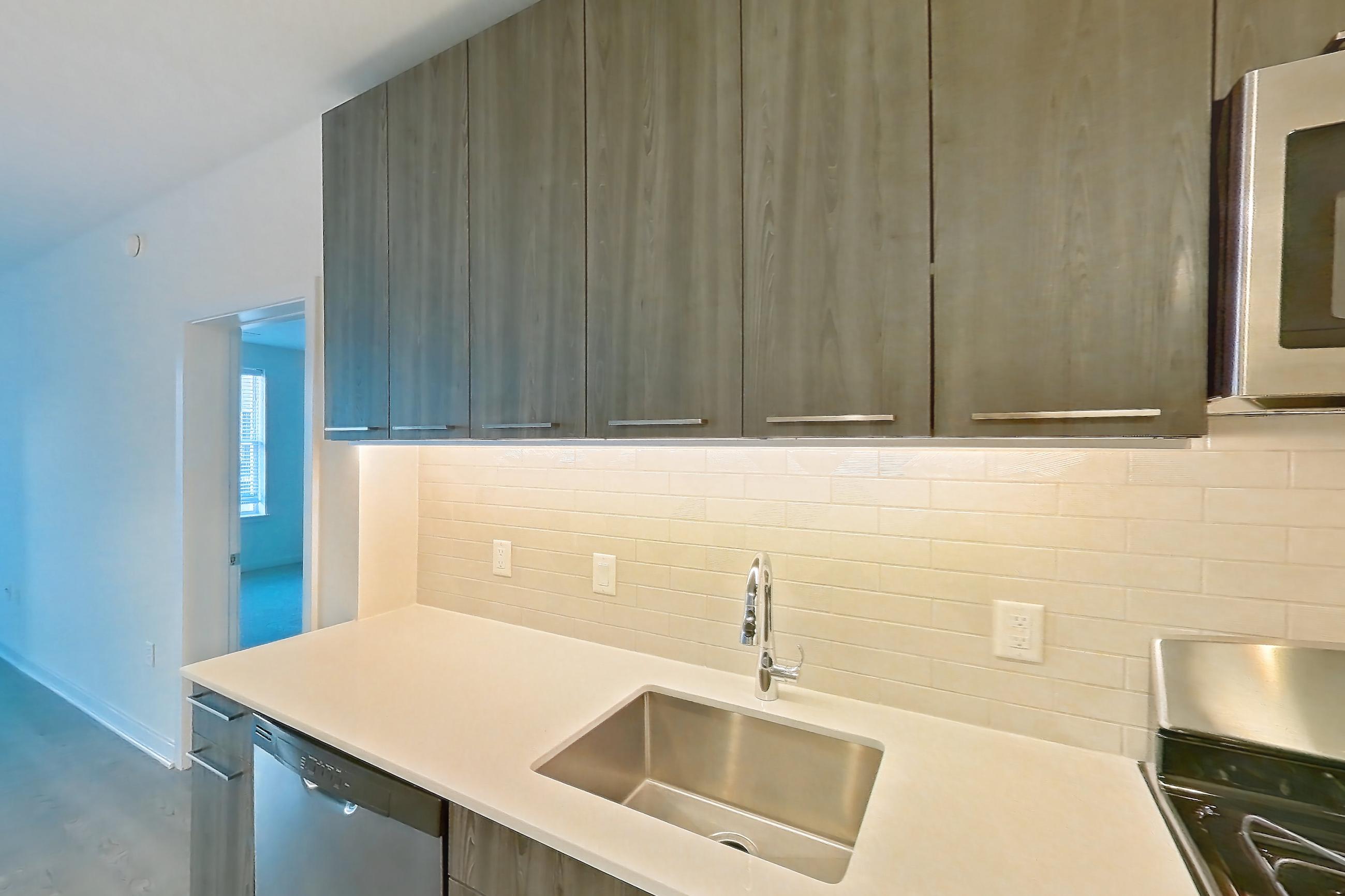 Kitchen in Apartment 502s at Cortland Columbia Pike, B14 floor plan