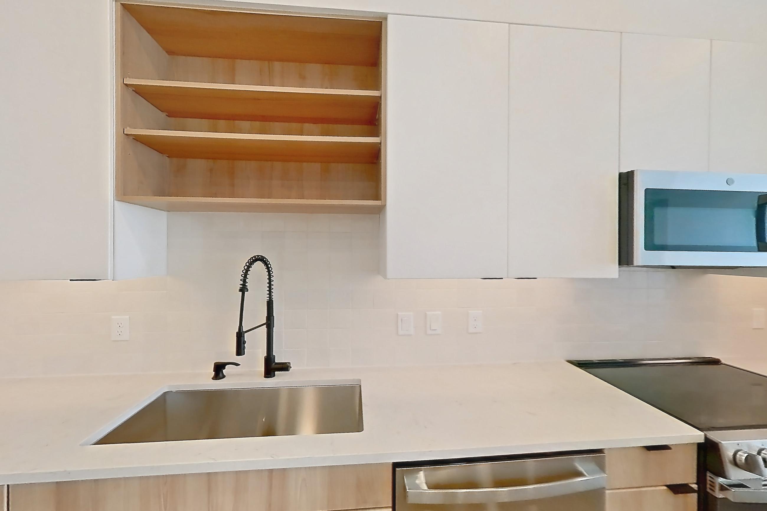 Kitchen in Apartment 404 at Lantower Sunrise, A1 floor plan