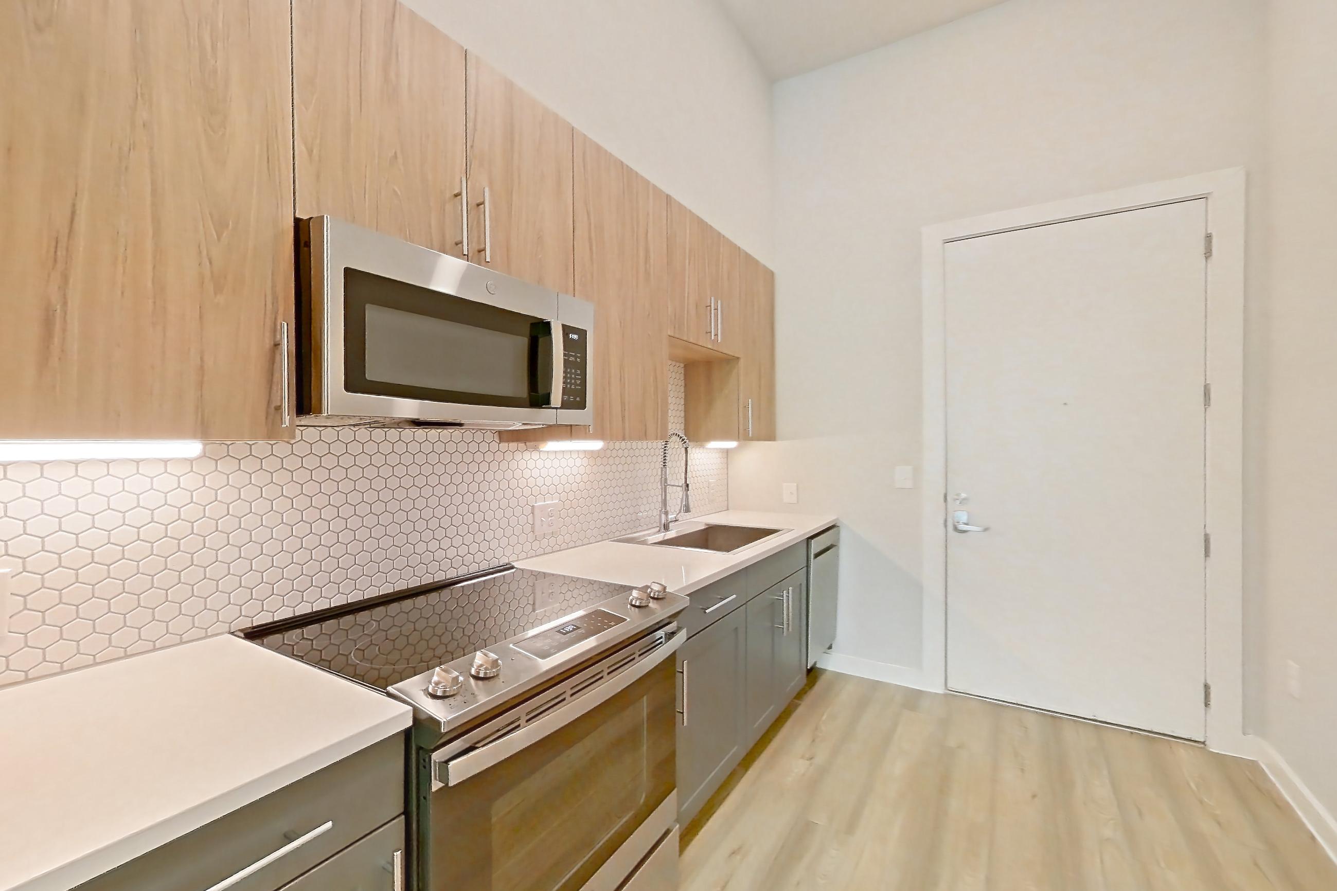 Kitchen in Apartment 2117 at Bridge at The Blockyard, 0C - AMI 50% - INCOME RESTRICTIONS APPLY floor plan