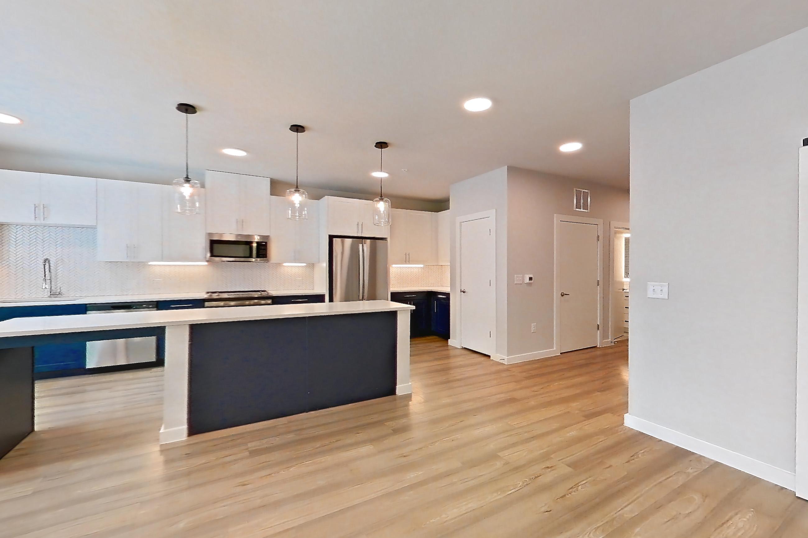 Living space in Apartment 2219 at Bridge at The Blockyard, 1E floor plan