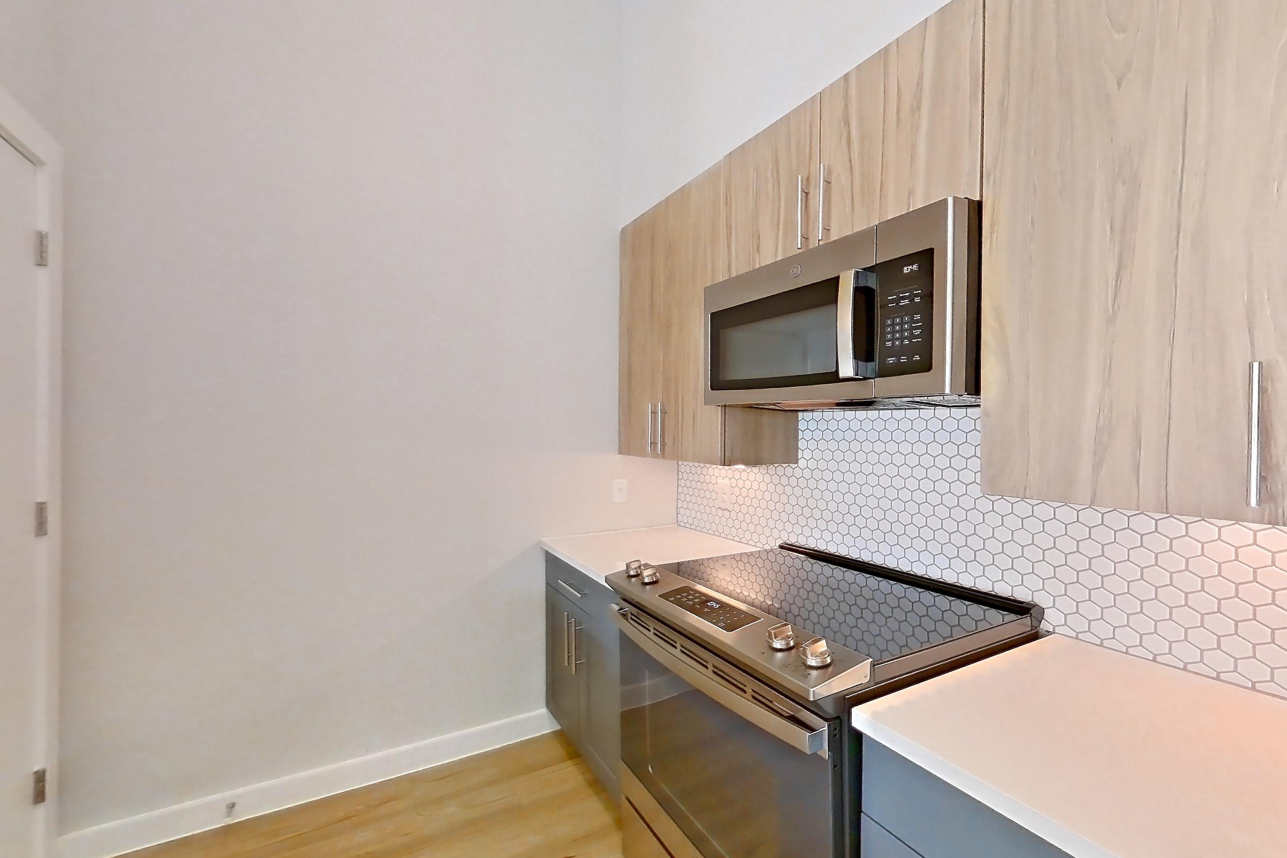 Kitchen in Apartment 1121 at Bridge at The Blockyard, LW2 - One-Bedroom Live-Work Townhome floor plan