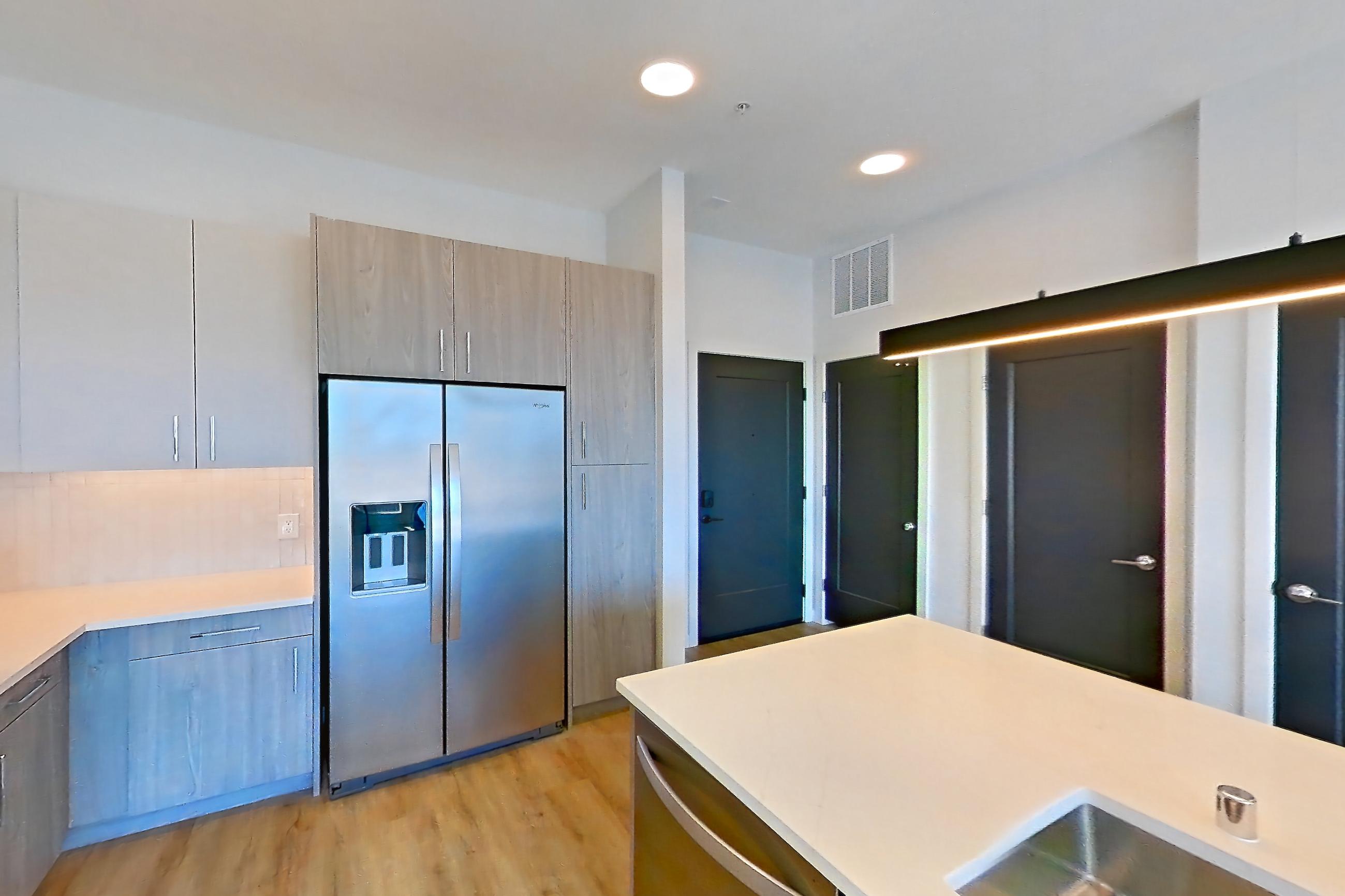 Kitchen in Apartment 411 at Gemma, A1-1A floor plan