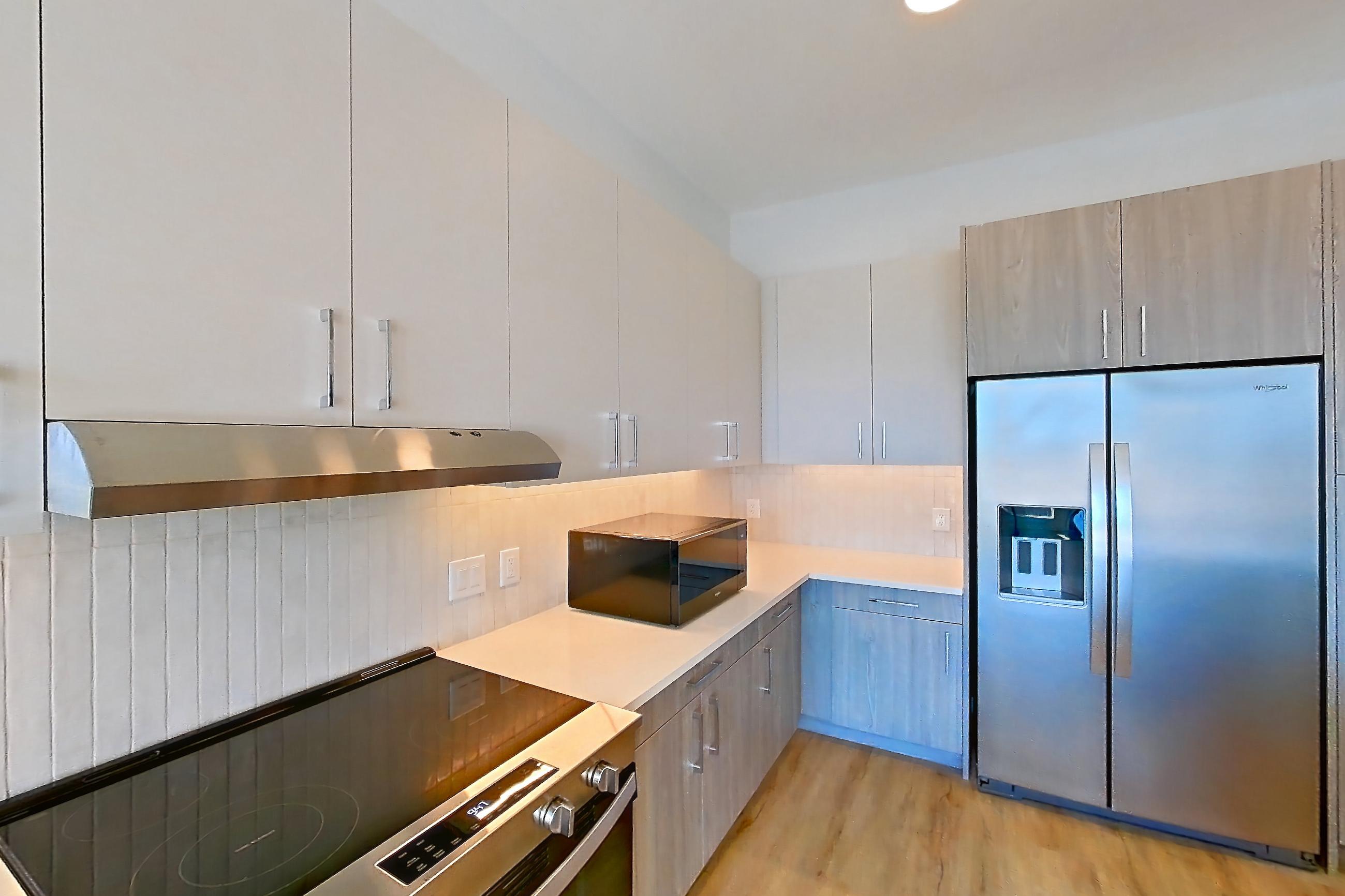 Kitchen in Apartment 411 at Gemma, A1-1A floor plan