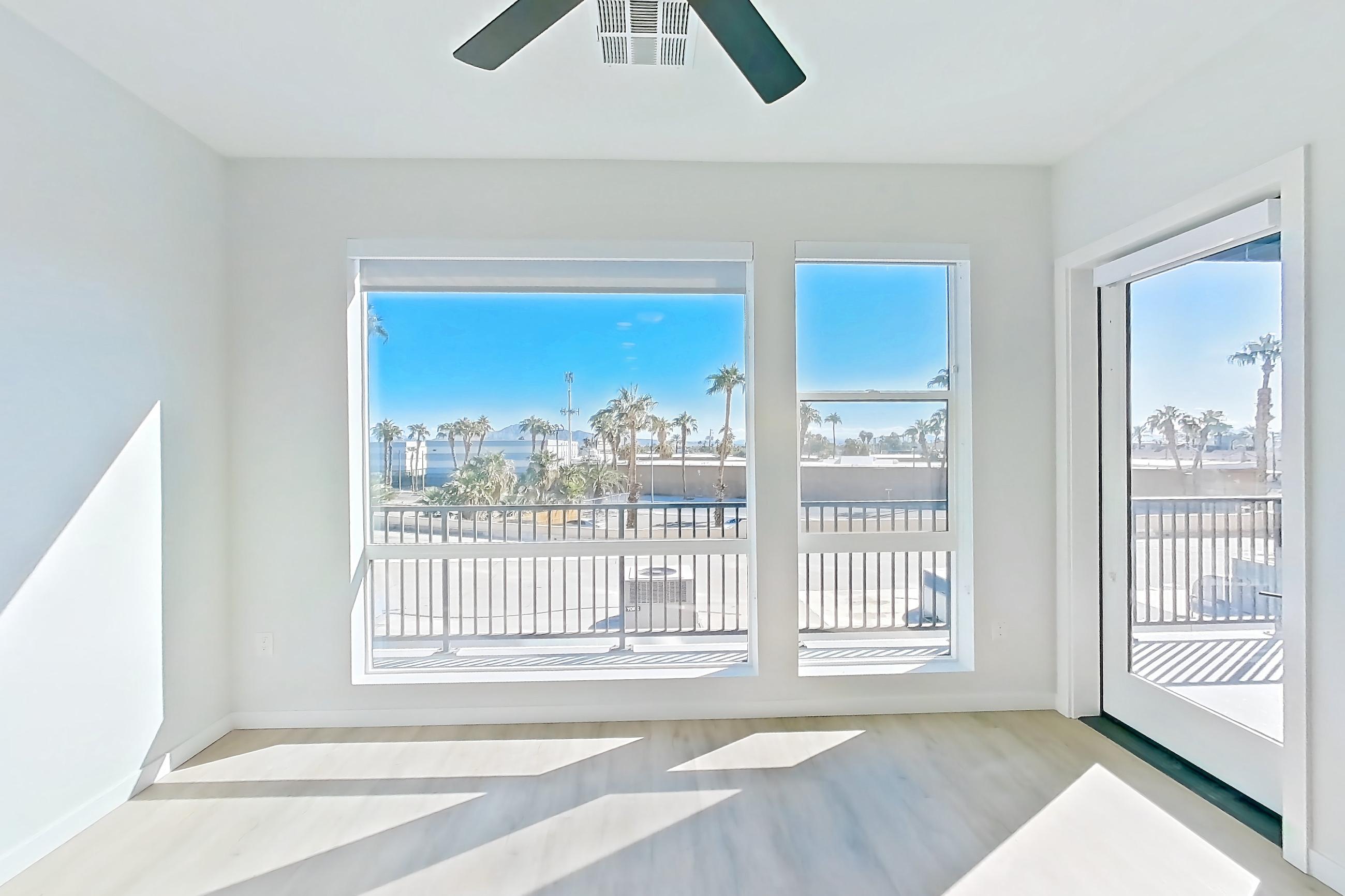 Living room with light wood-finish flooring, Apartment 307 at Gemma