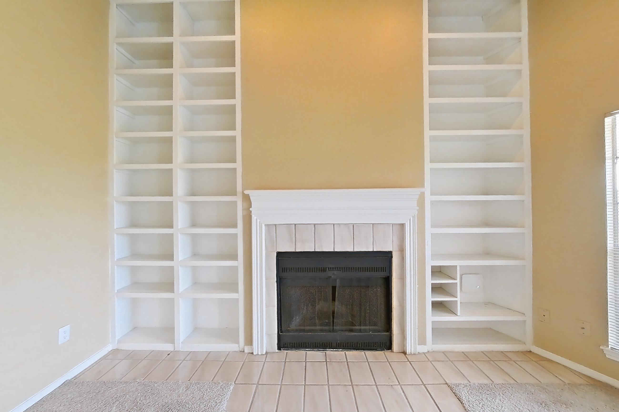 Living space with fireplace and tile fireplace, Apartment 921 at Museo and Channings Mark