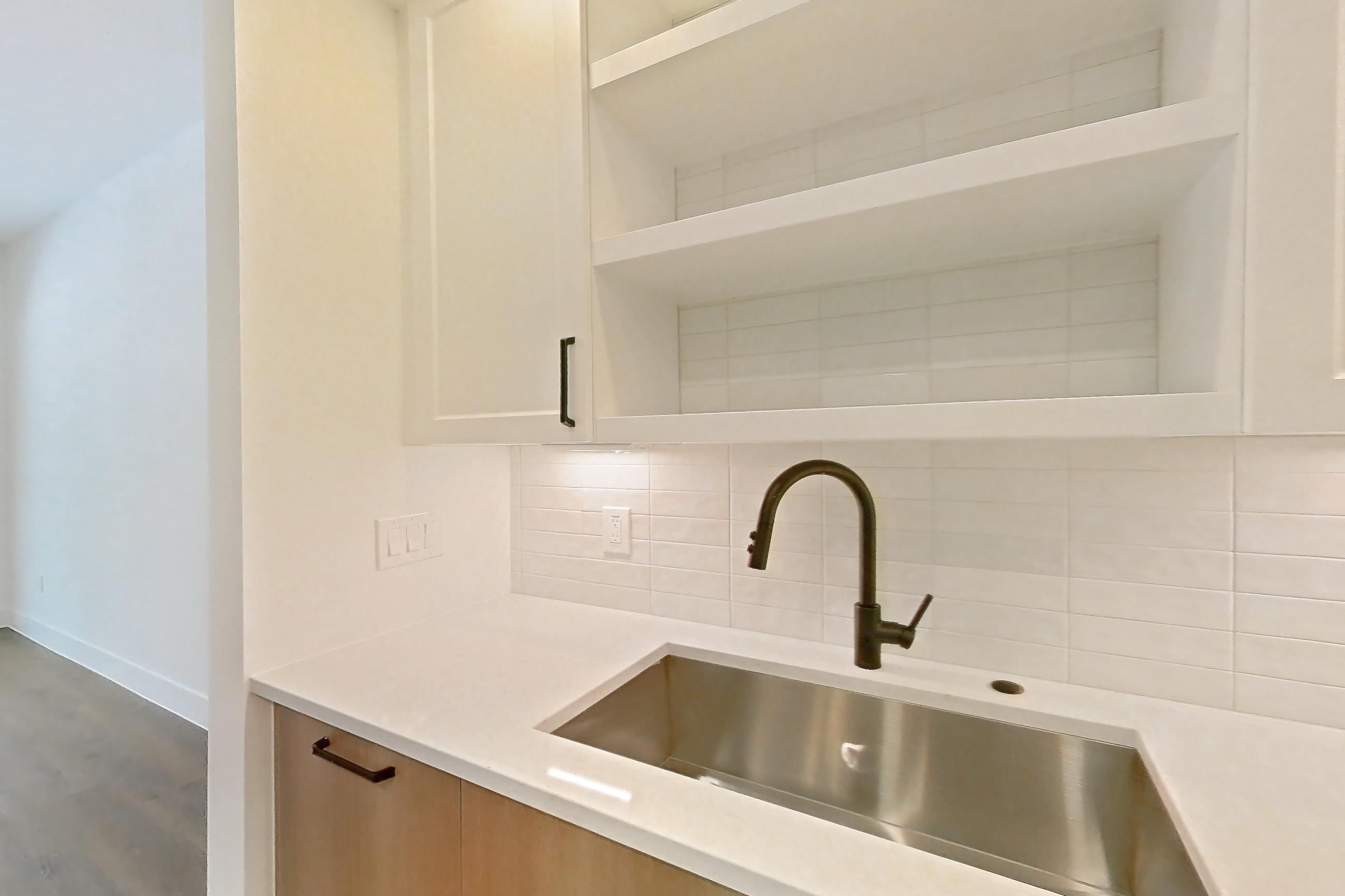 Kitchen in a A4.1 floor plan apartment, representative of Apartment 356 at The Watson