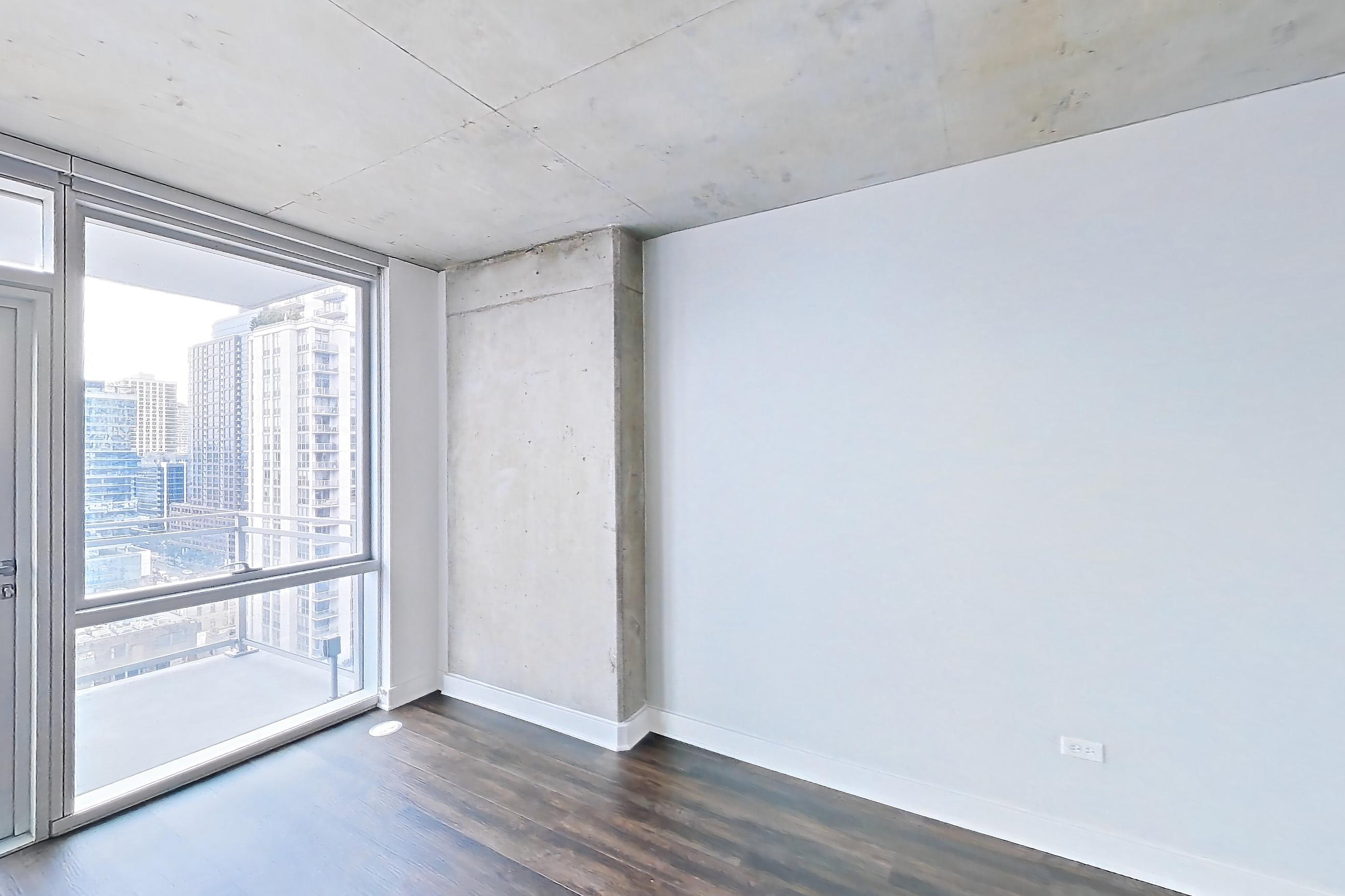 Living room in Apartment 1703 at 220 WIL, A10 + Den floor plan
