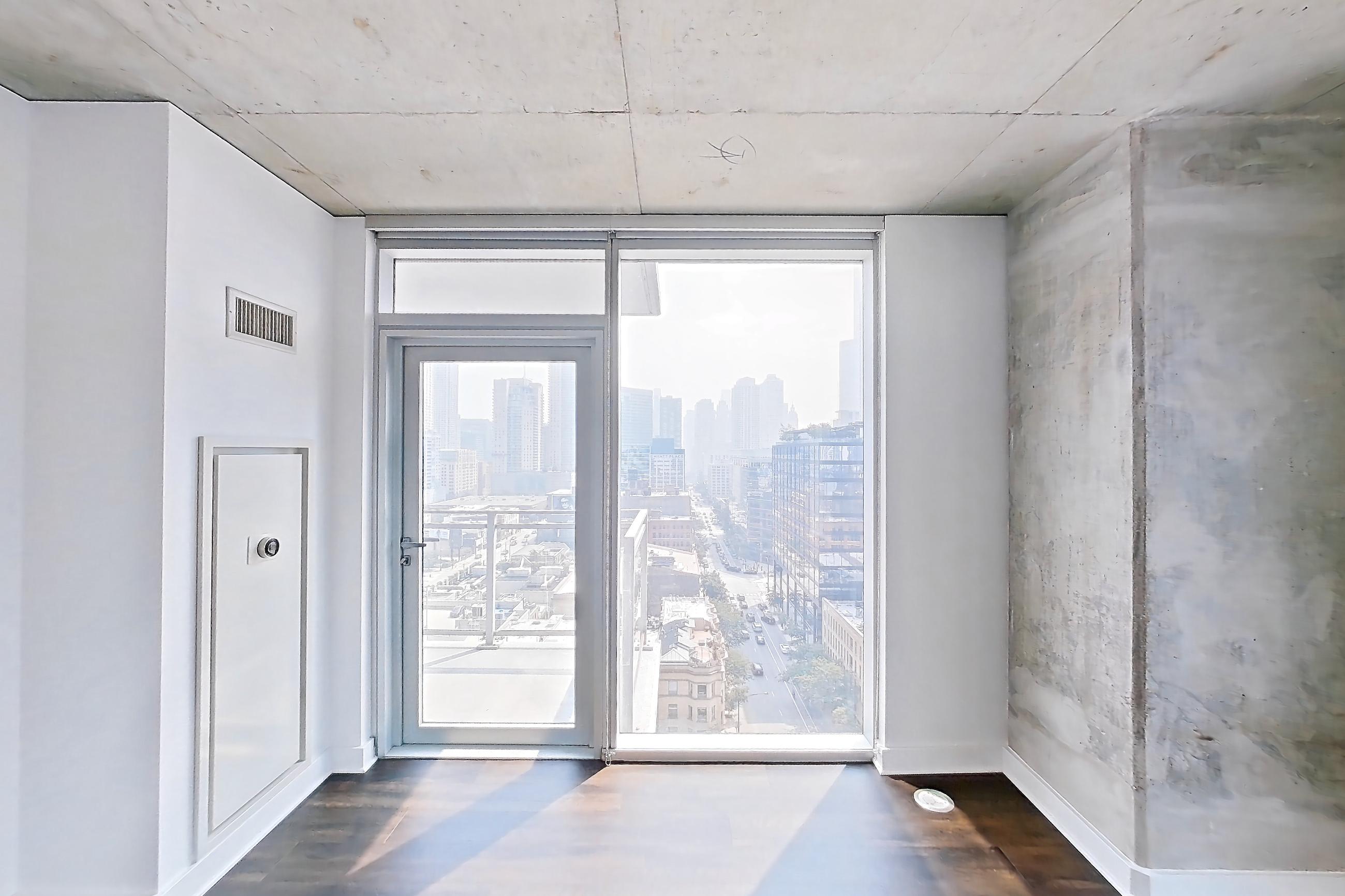 Living room with city view and skyline view, Apartment 1610 at 220 WIL