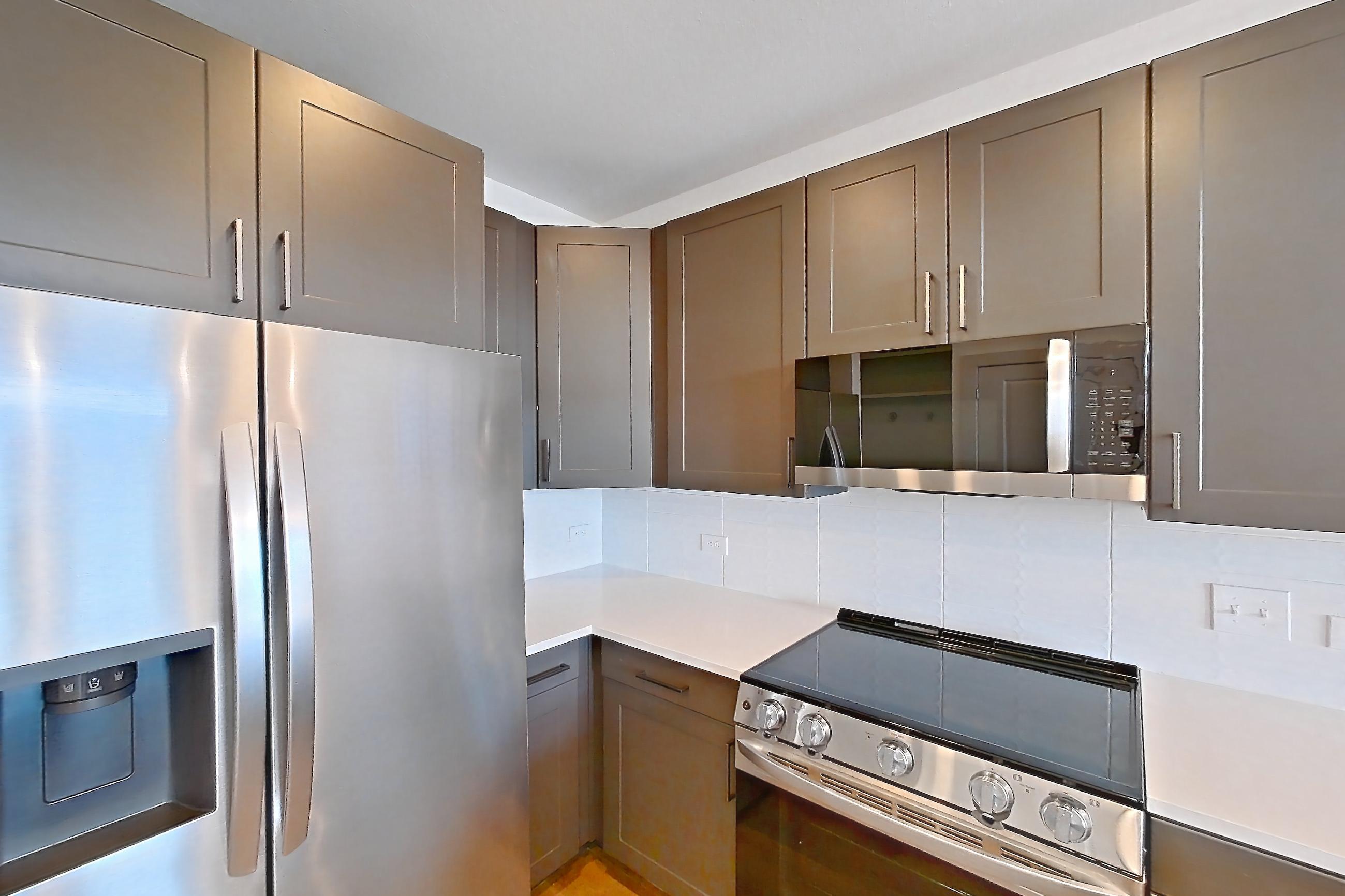 Kitchen in a A1 floor plan apartment, representative of Apartment 2115 at Groves South Congress