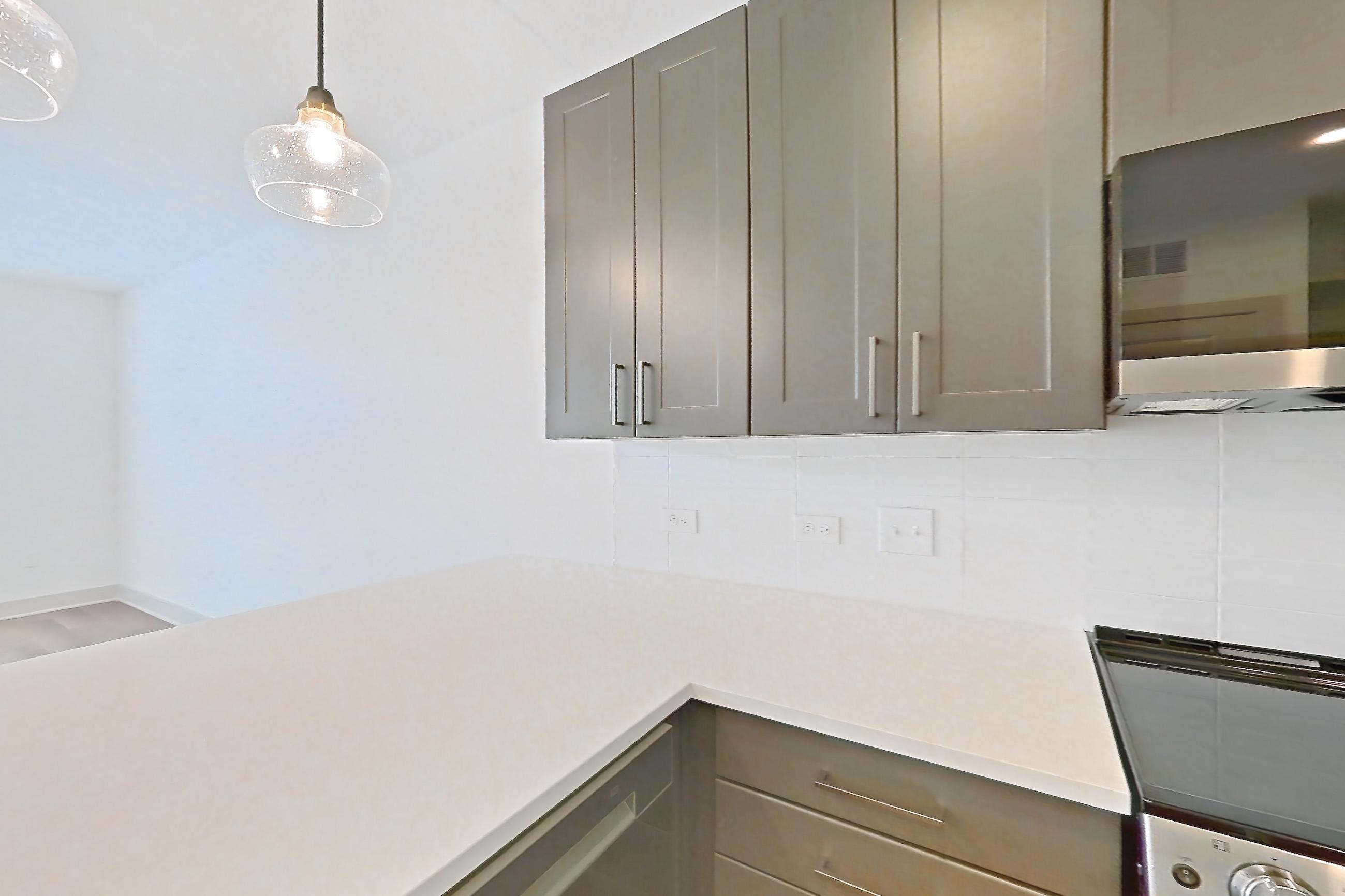 Kitchen in a A2 floor plan apartment, representative of Apartment 2113 at Groves South Congress