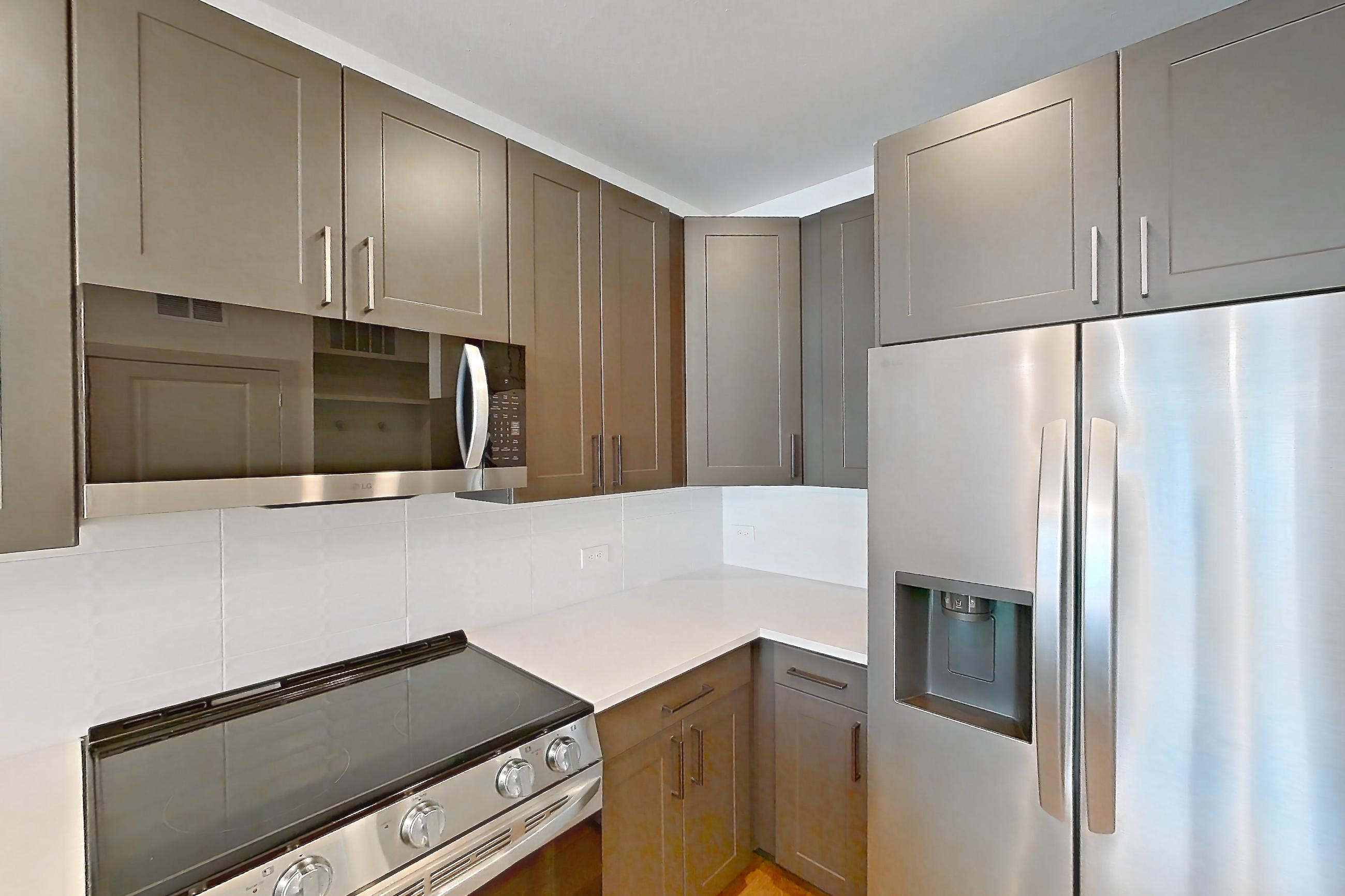 Kitchen in a A2a floor plan apartment, representative of Apartment 2409 at Groves South Congress
