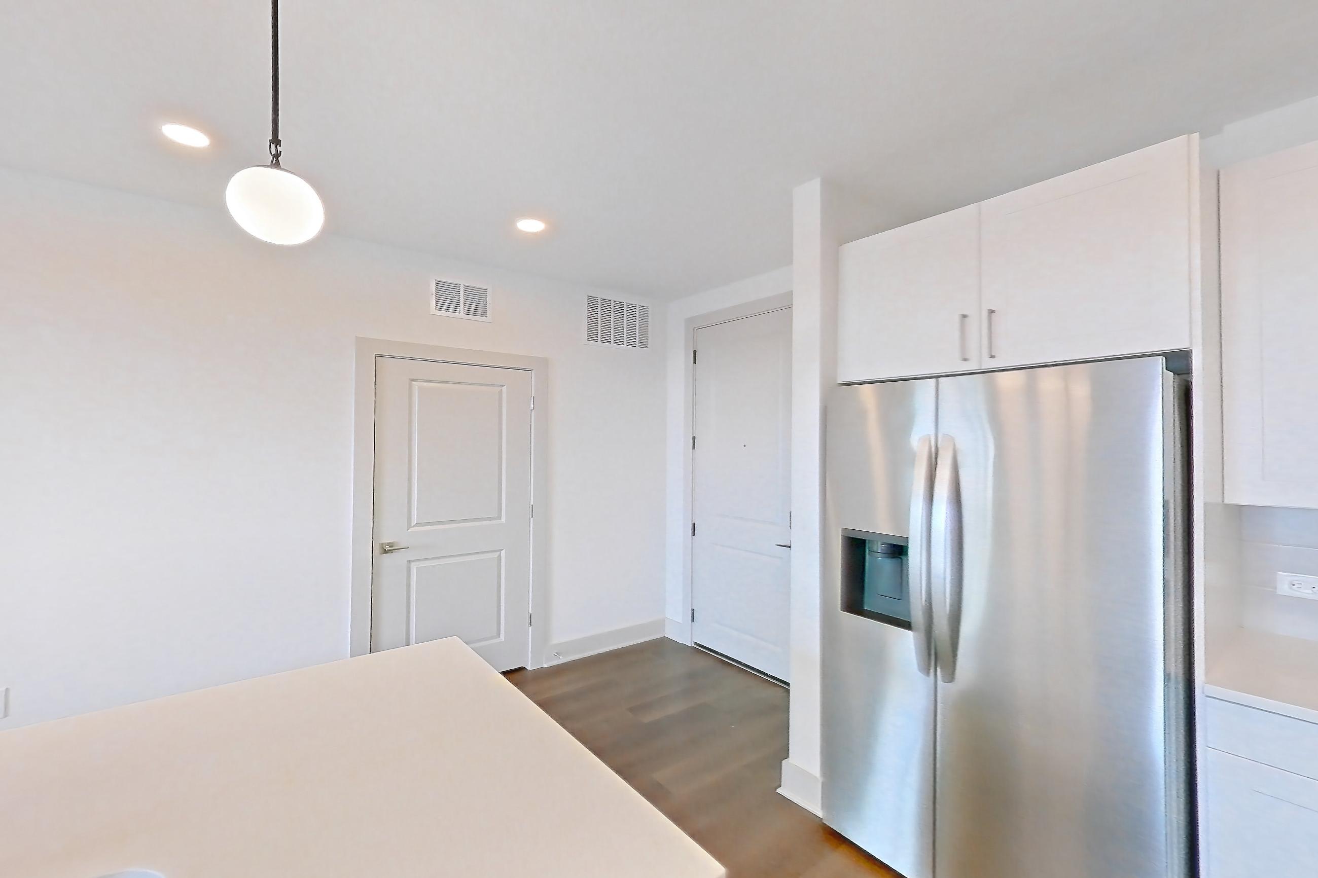 Kitchen in a A4 floor plan apartment, representative of Apartment 2218 at Groves South Congress