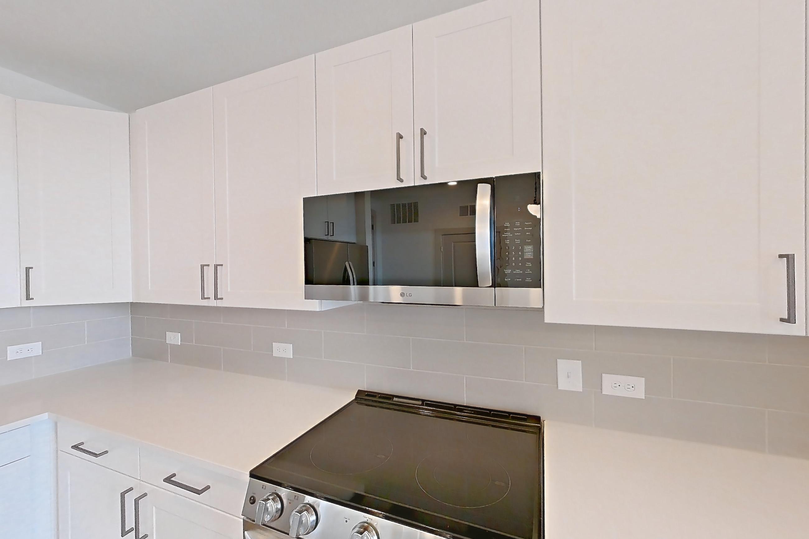 Kitchen in a A4 floor plan apartment, representative of Apartment 2218 at Groves South Congress