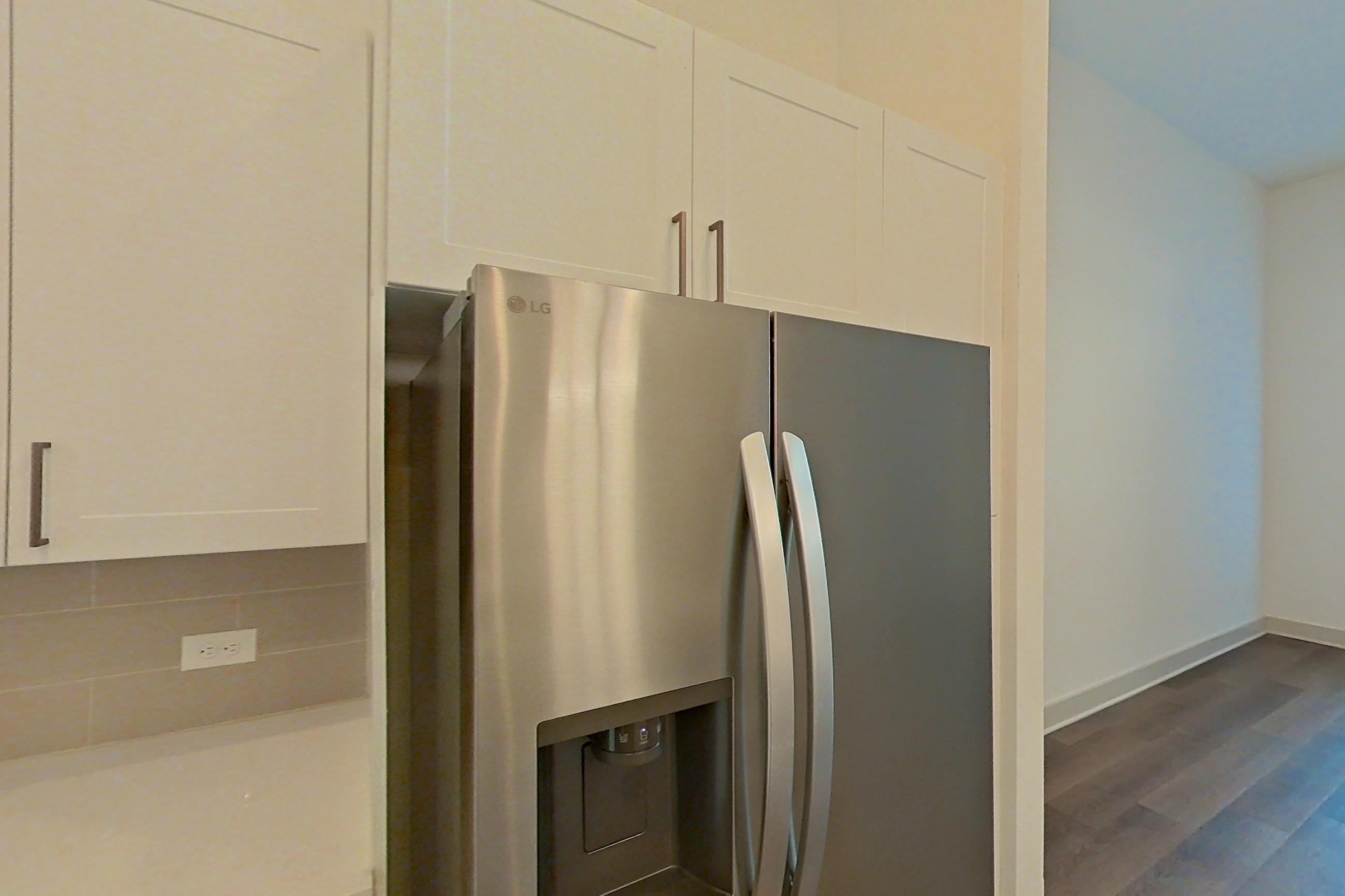 Kitchen in a A6 floor plan apartment, representative of Apartment 2433 at Groves South Congress