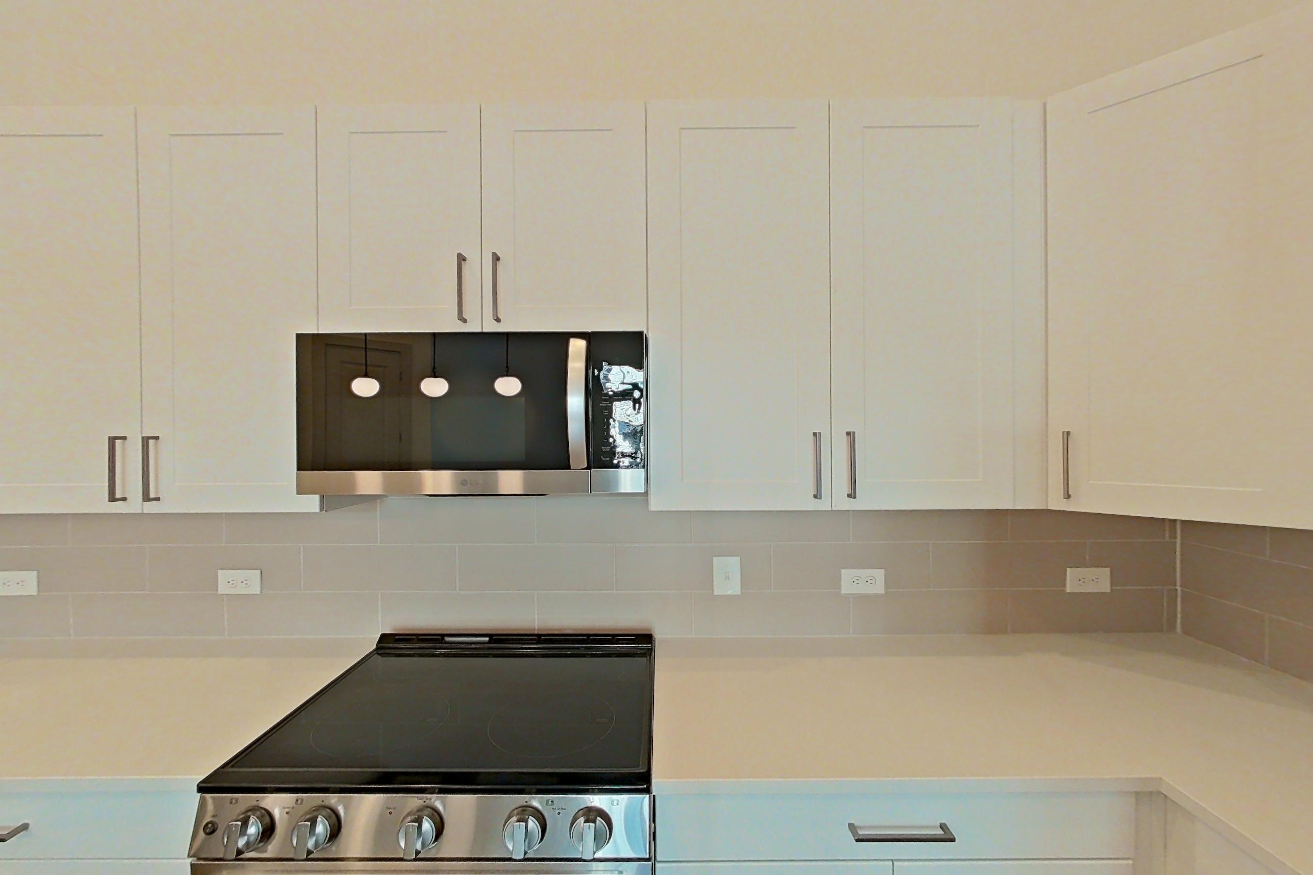 Kitchen in a A6 floor plan apartment, representative of Apartment 2433 at Groves South Congress