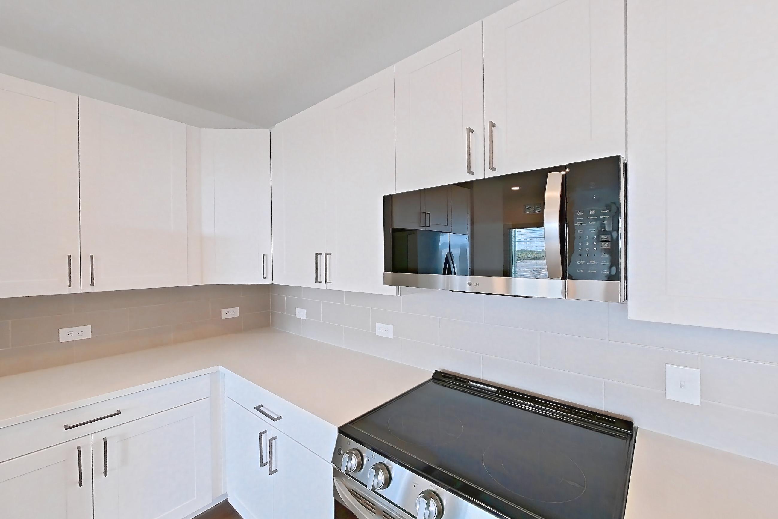 Kitchen in a B3 floor plan apartment, representative of Apartment 2216 at Groves South Congress