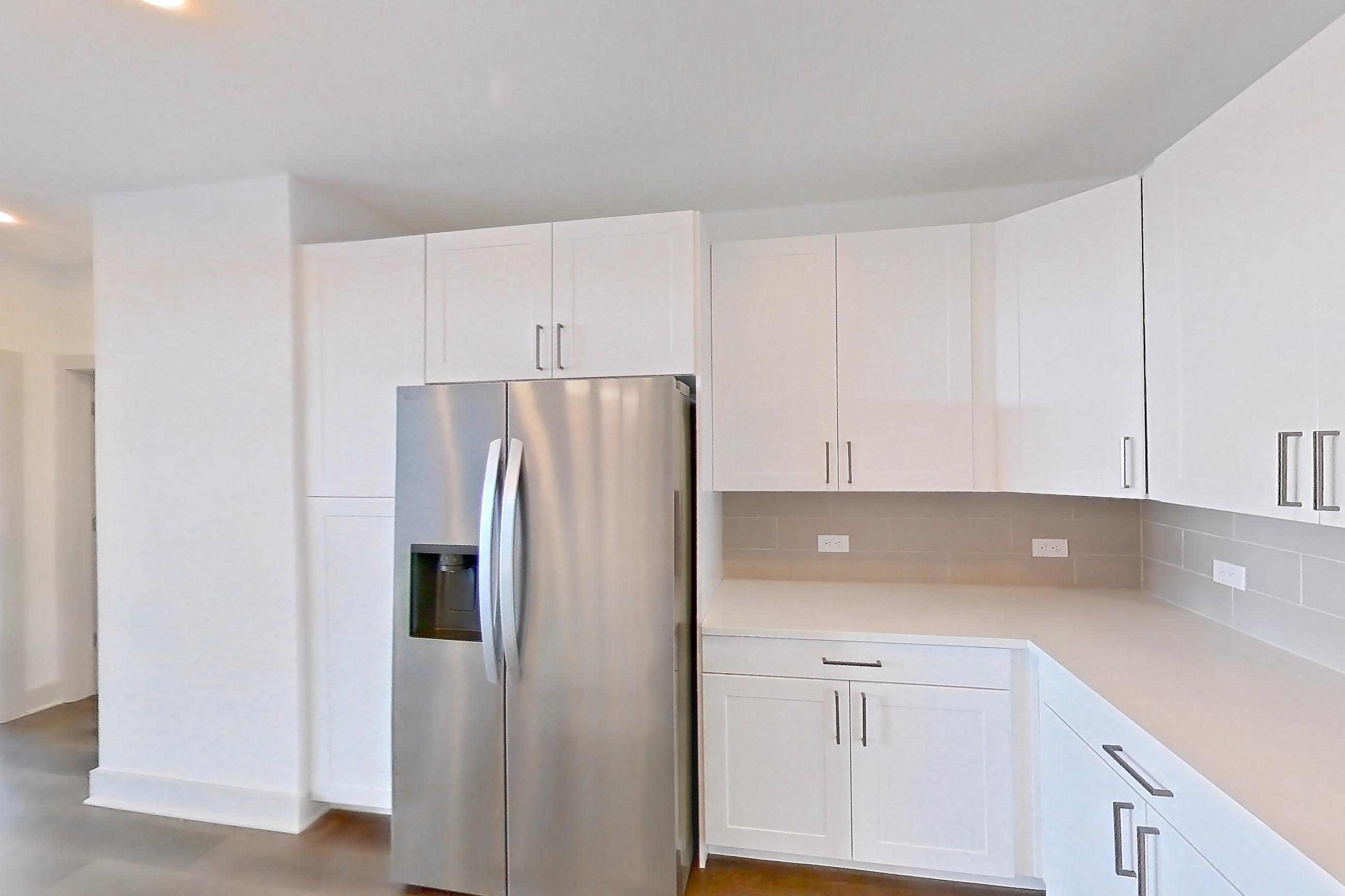 Kitchen in a B3 floor plan apartment, representative of Apartment 2216 at Groves South Congress