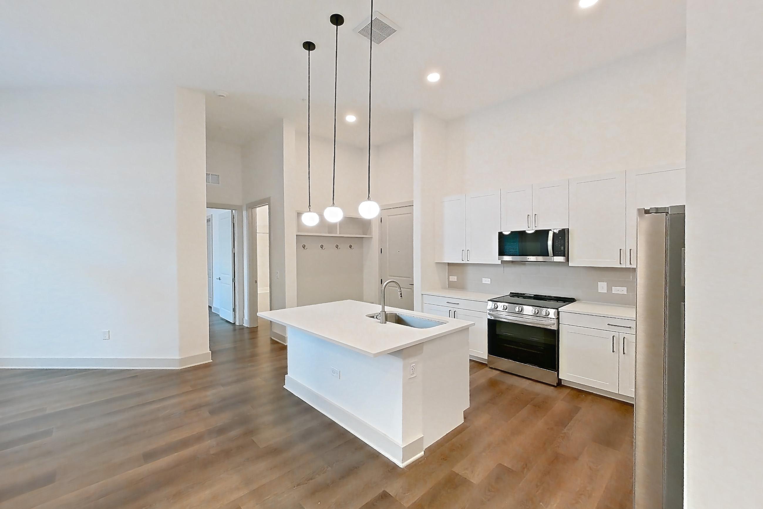 Dining room in a B4 floor plan apartment, representative of Apartment 2140 at Groves South Congress