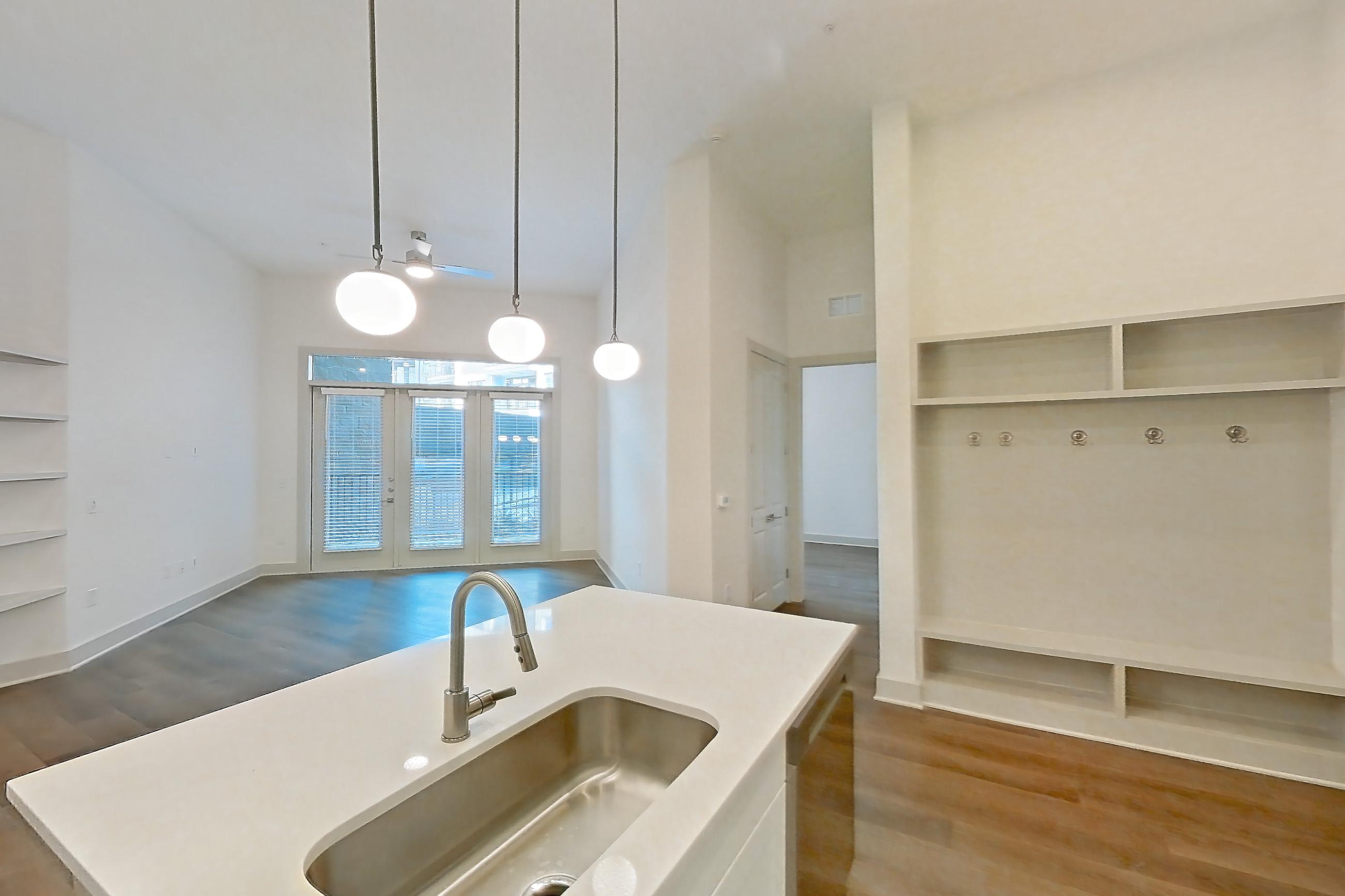 Kitchen in a B4 floor plan apartment, representative of Apartment 2140 at Groves South Congress
