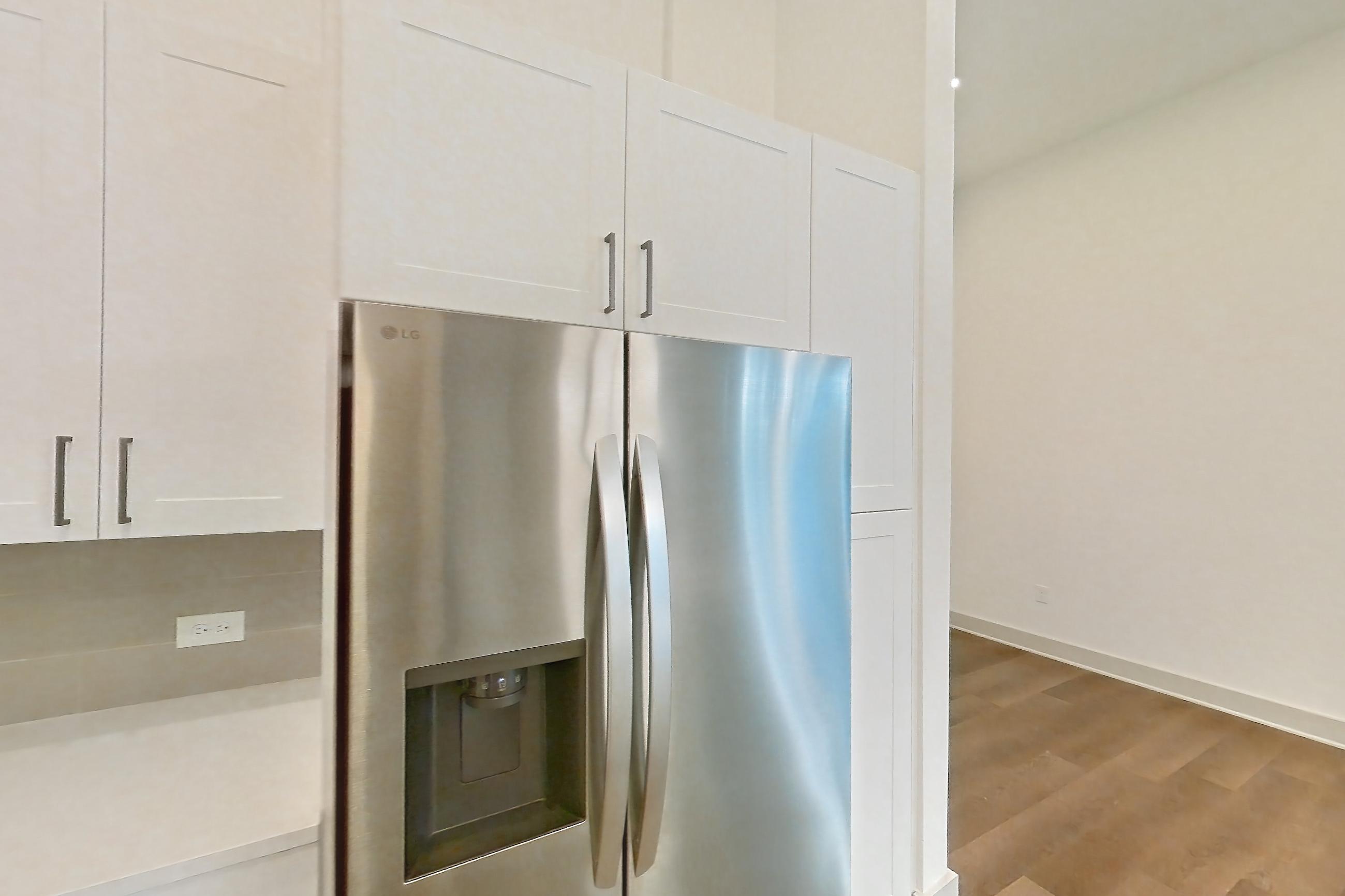 Kitchen in a B4 floor plan apartment, representative of Apartment 2140 at Groves South Congress