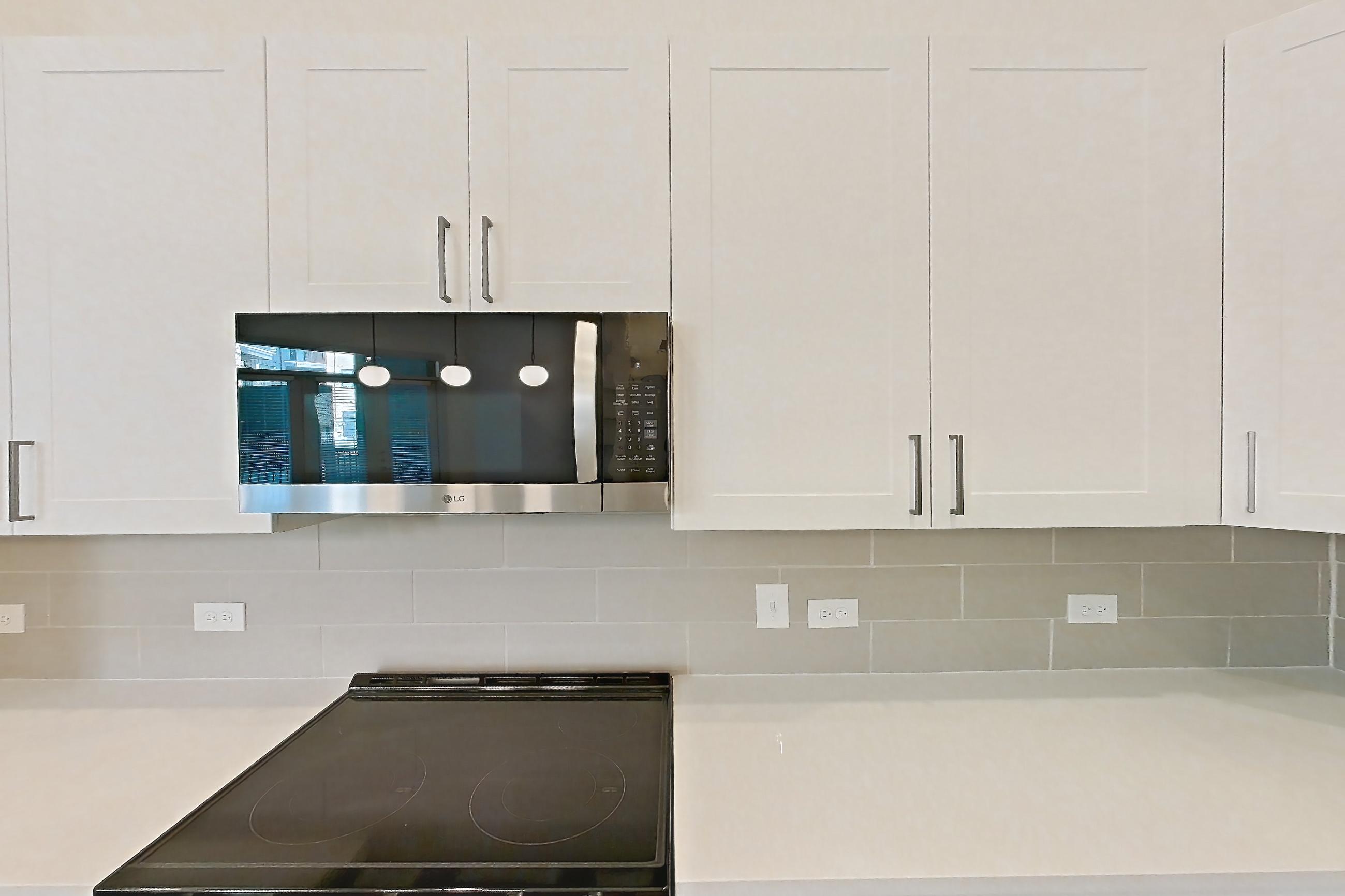 Kitchen in a B4 floor plan apartment, representative of Apartment 2140 at Groves South Congress