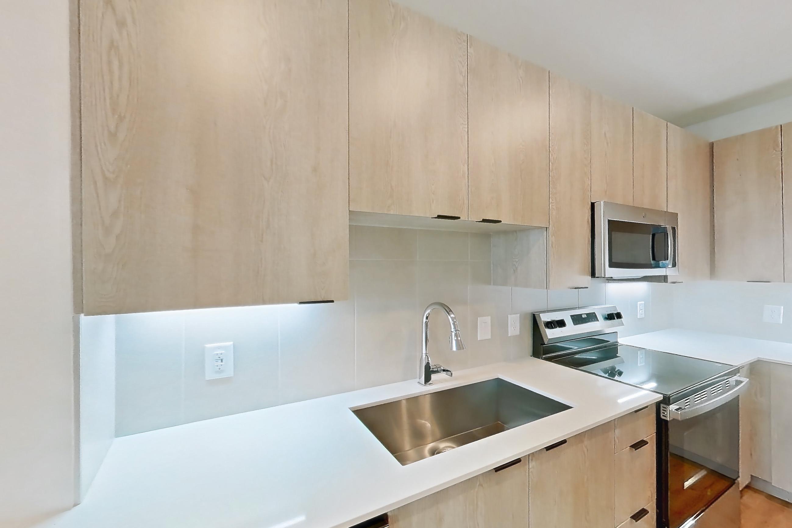 Kitchen in Apartment 1410 at Caroline Anclote Harbor, A1-S floor plan