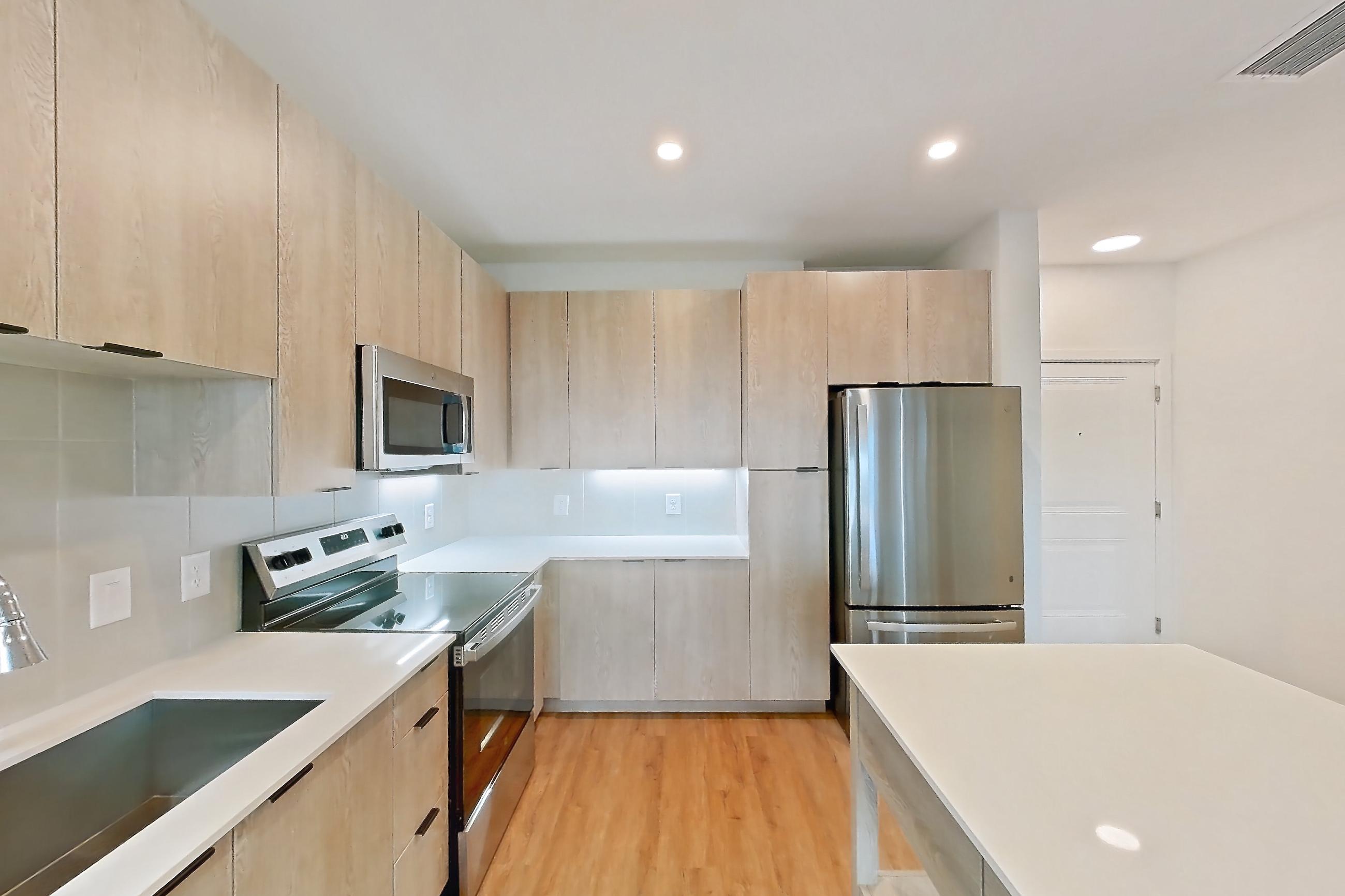 Kitchen in Apartment 1410 at Caroline Anclote Harbor, A1-S floor plan