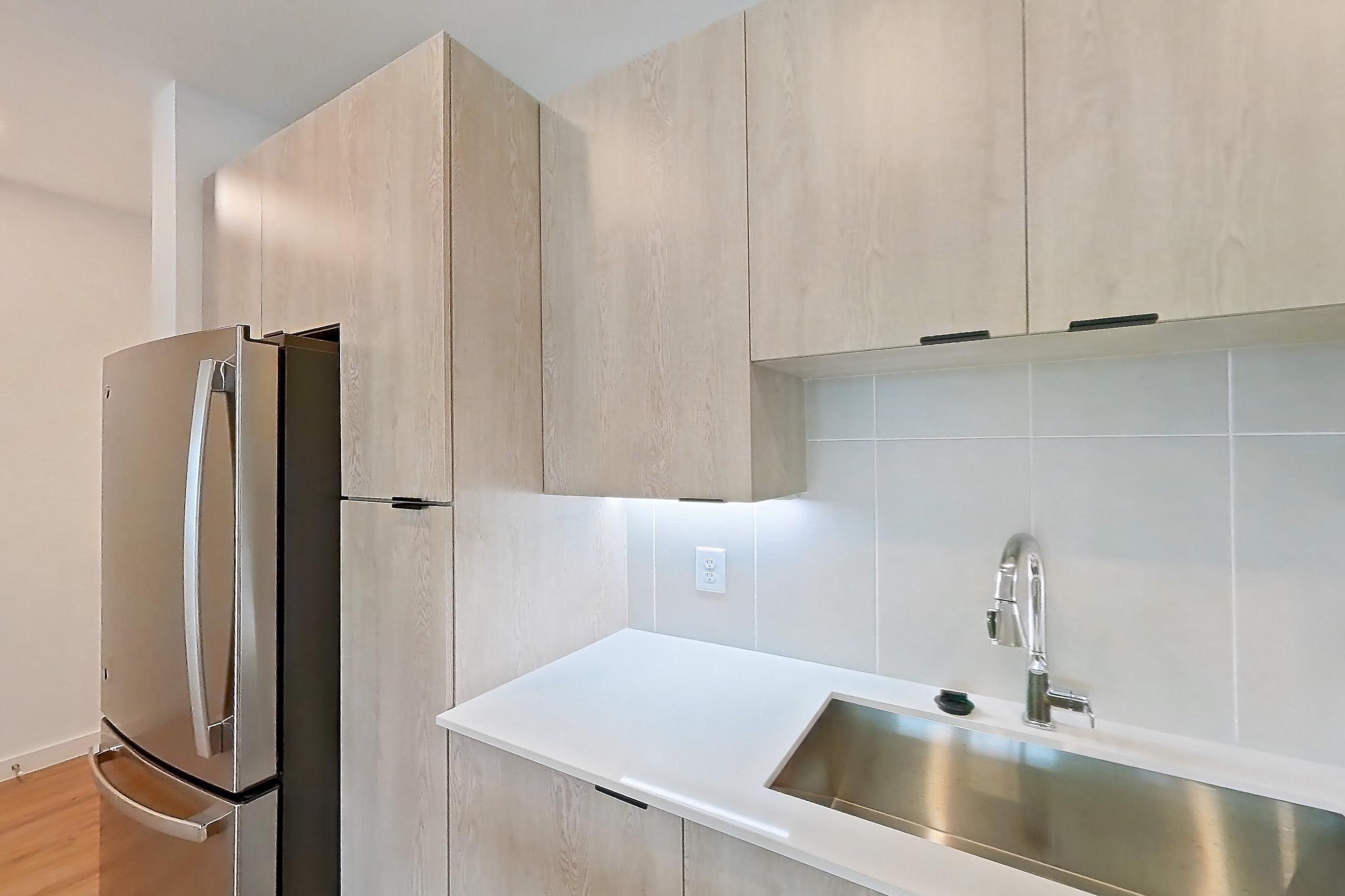 Kitchen in Apartment 1109 at Caroline Anclote Harbor, A4 floor plan