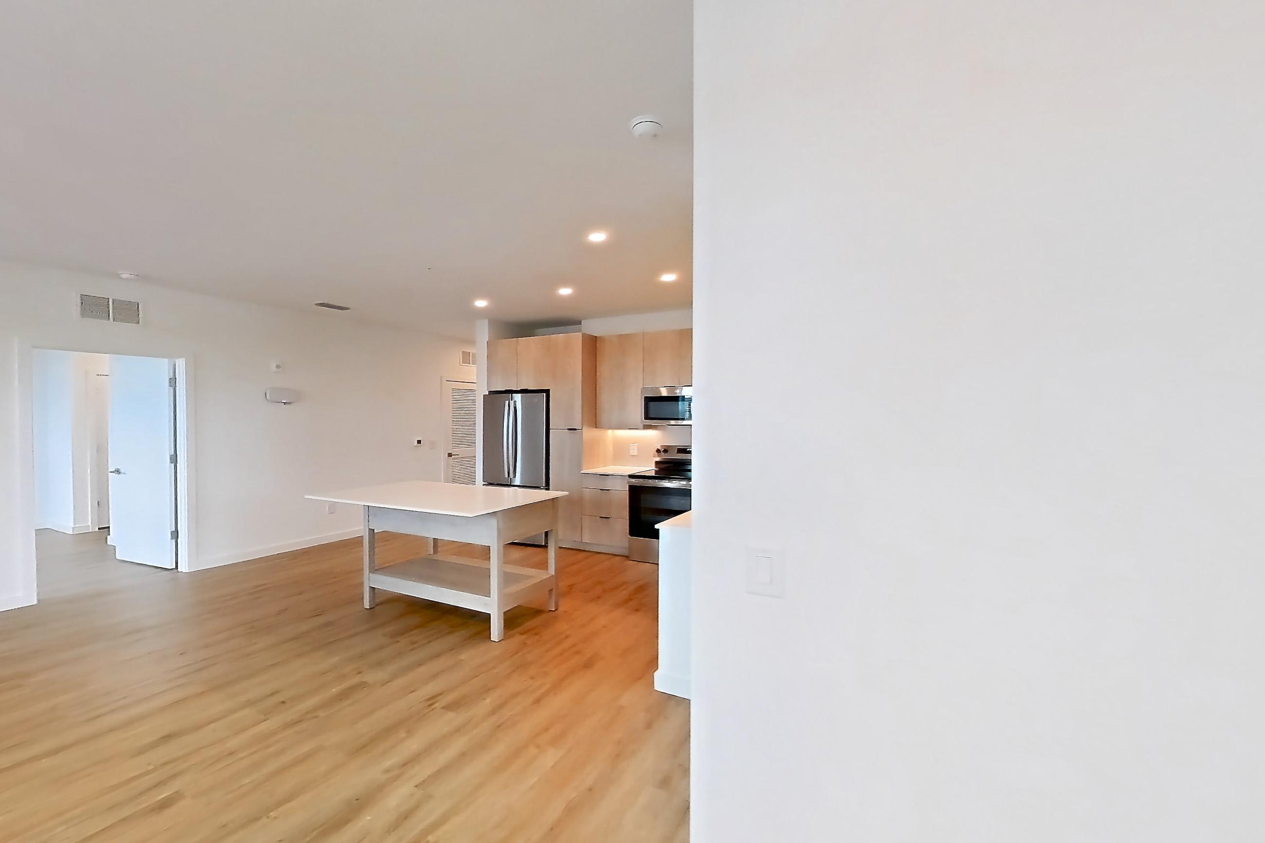 Dining room in Apartment 1221 at Caroline Anclote Harbor, B2 floor plan