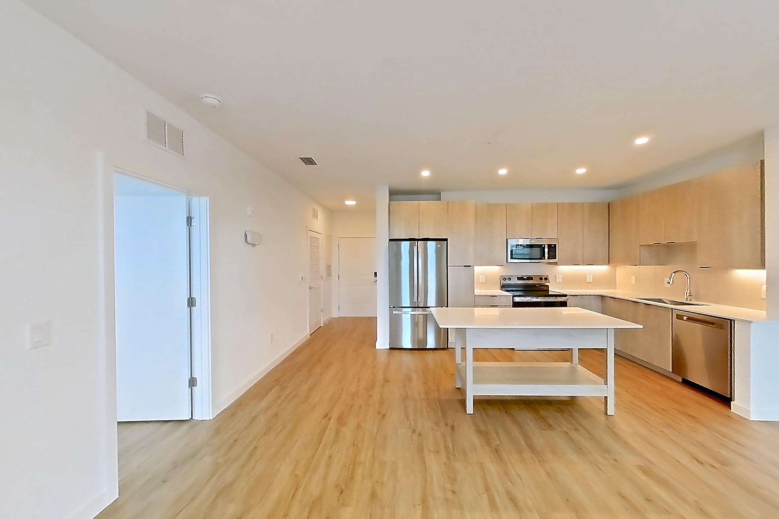 Living space in Apartment 1221 at Caroline Anclote Harbor, B2 floor plan