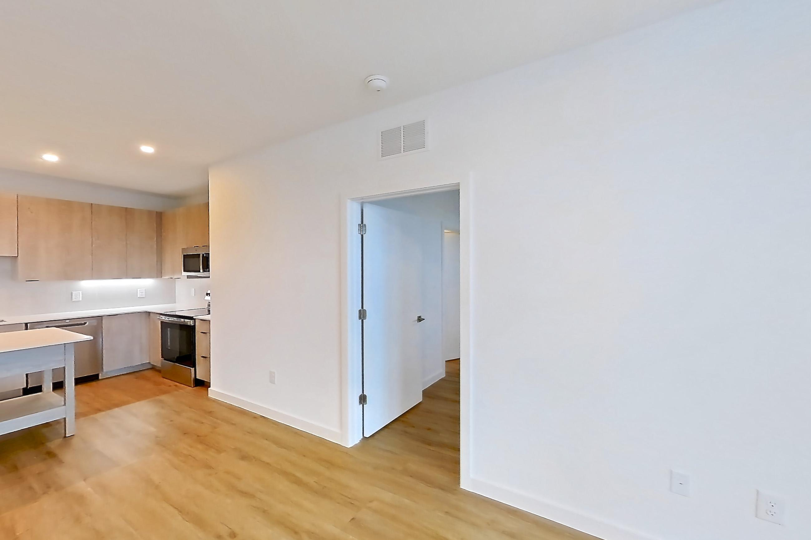 Living space in Apartment 1317 at Caroline Anclote Harbor, B1-E2 floor plan