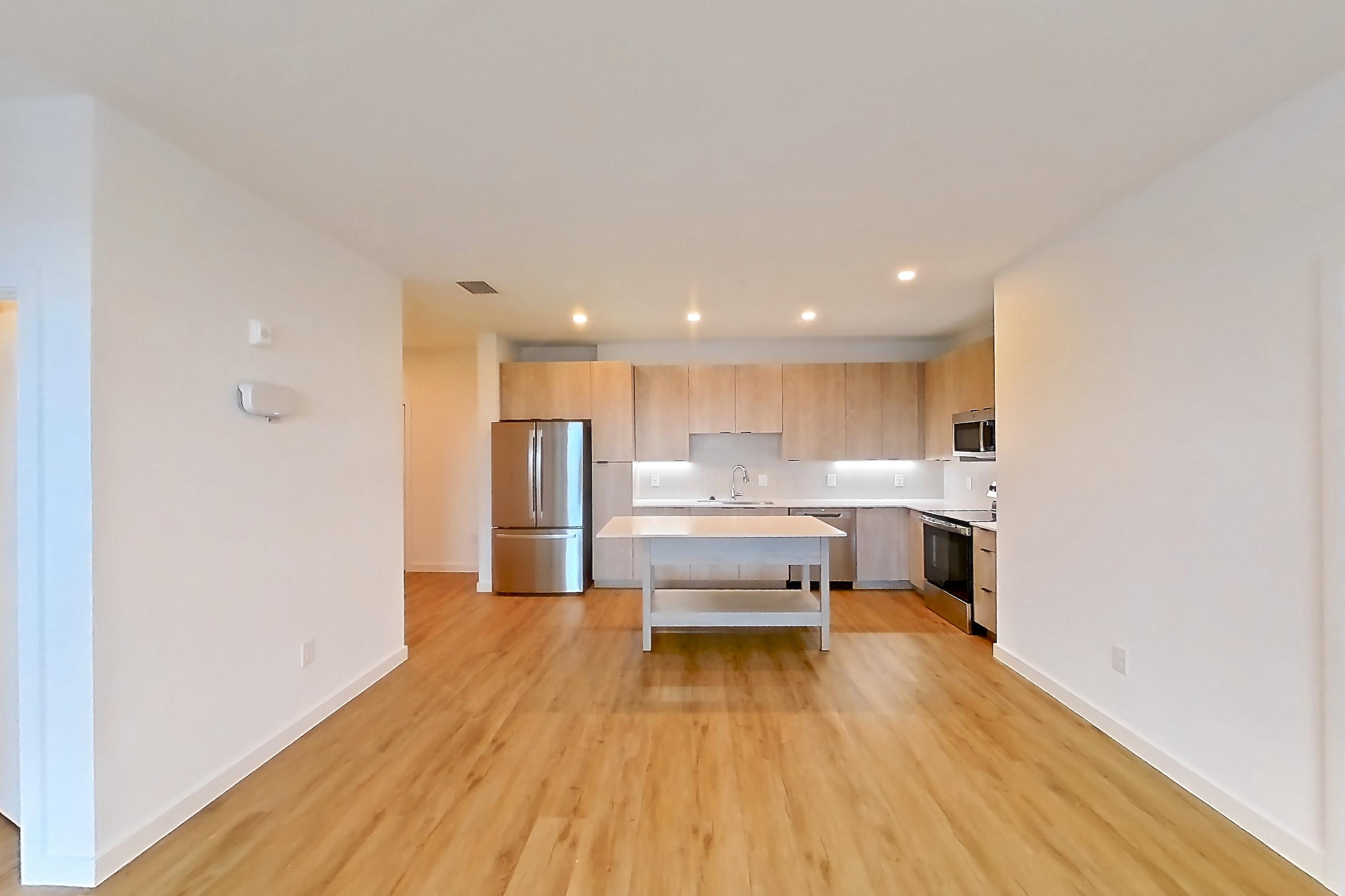 Living space in Apartment 1317 at Caroline Anclote Harbor, B1-E2 floor plan