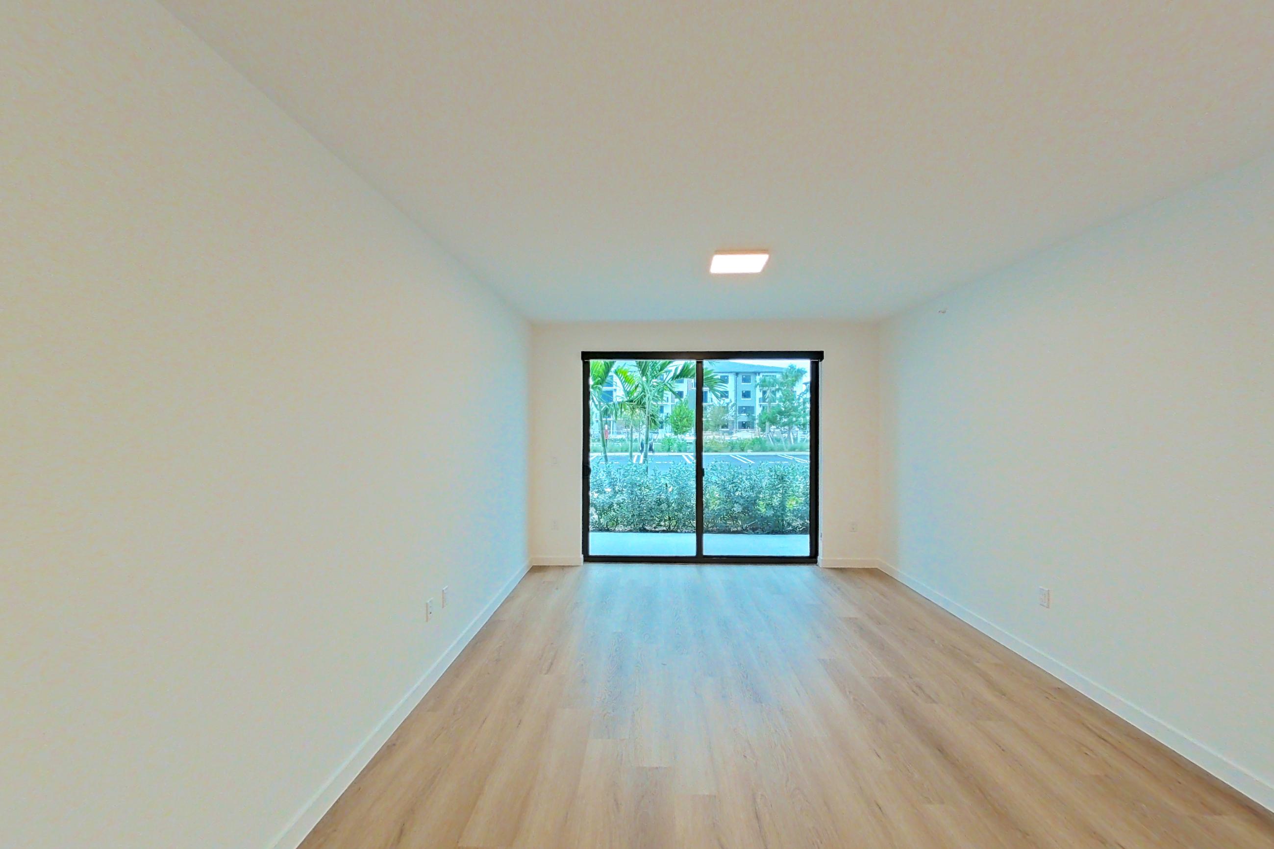 Living space in Apartment 107 at Caroline Pompano Beach, A3 floor plan