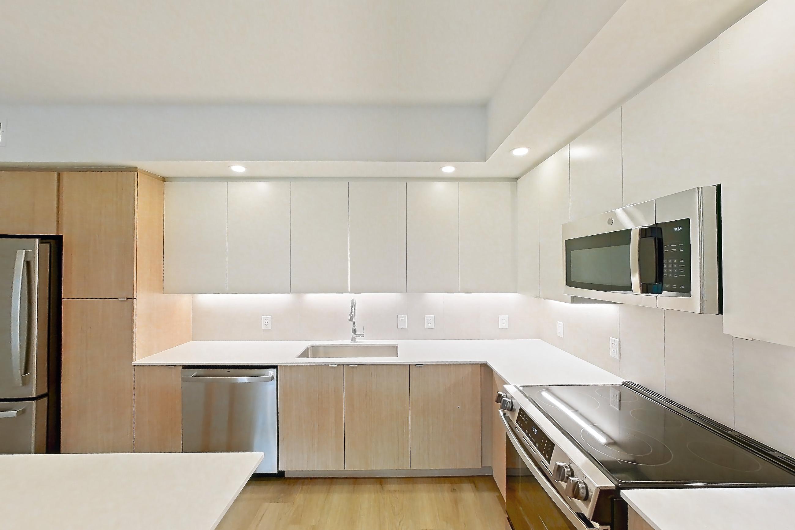 Kitchen island corner in Apartment 108 at Caroline Pompano Beach, A4 floor plan