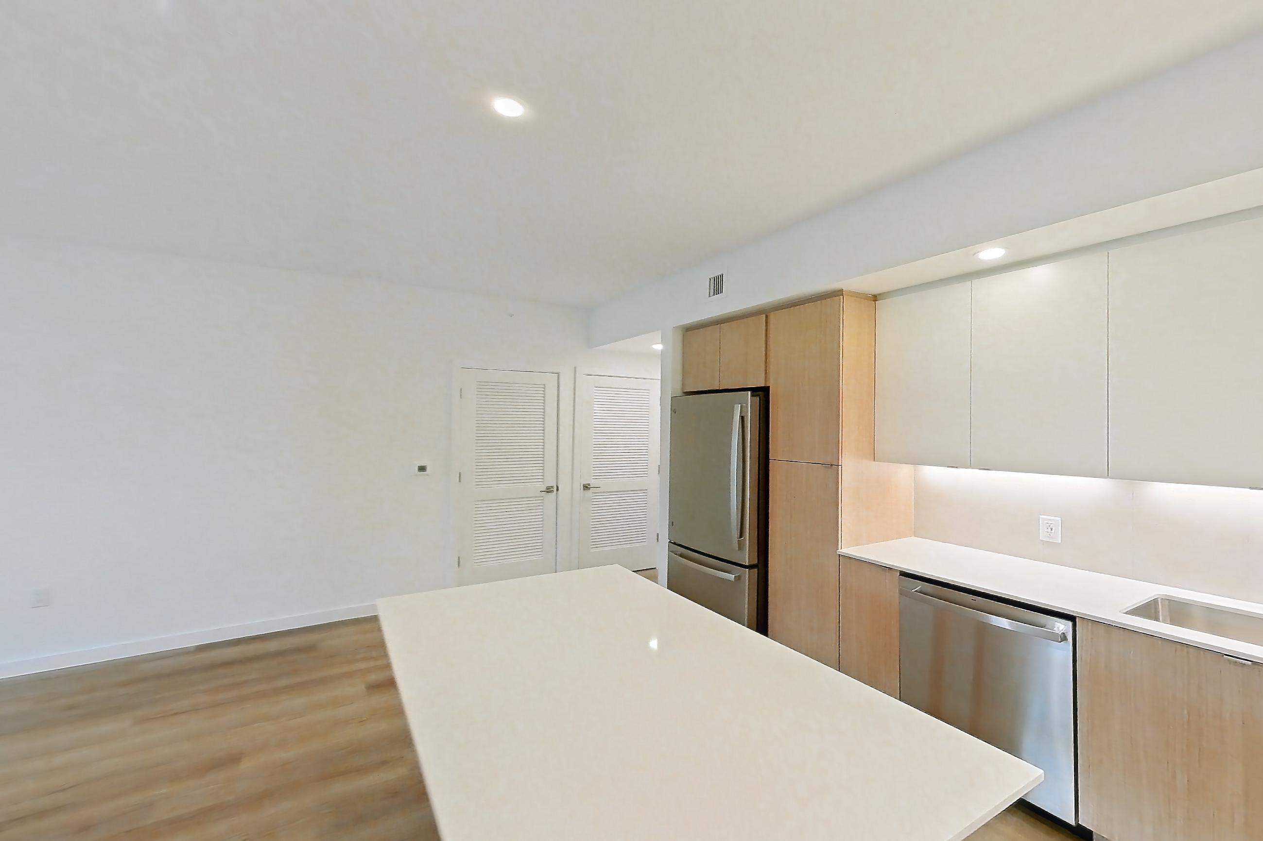 Kitchen island corner in Apartment 108 at Caroline Pompano Beach, A4 floor plan