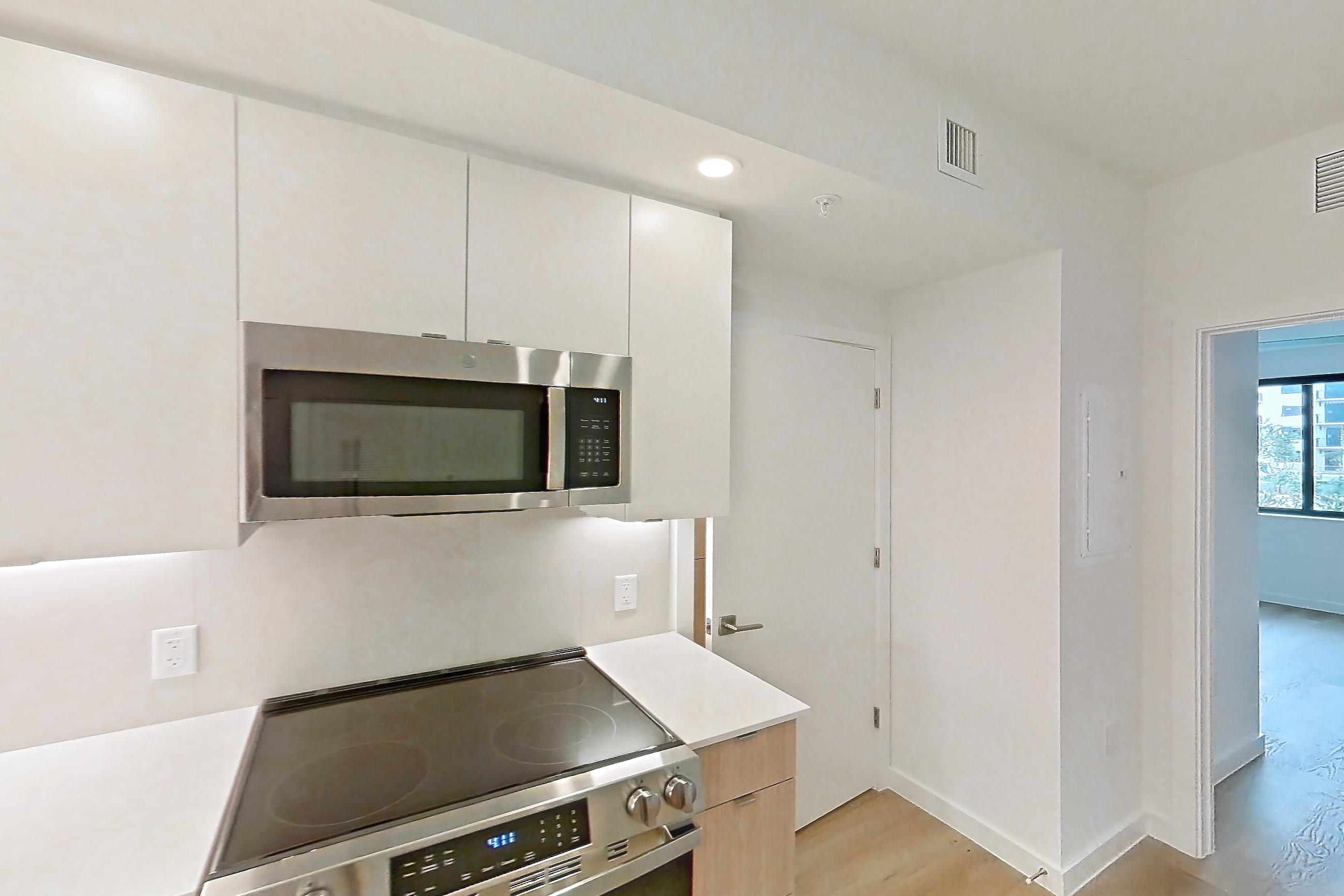 Kitchen in Apartment 108 at Caroline Pompano Beach, A4 floor plan