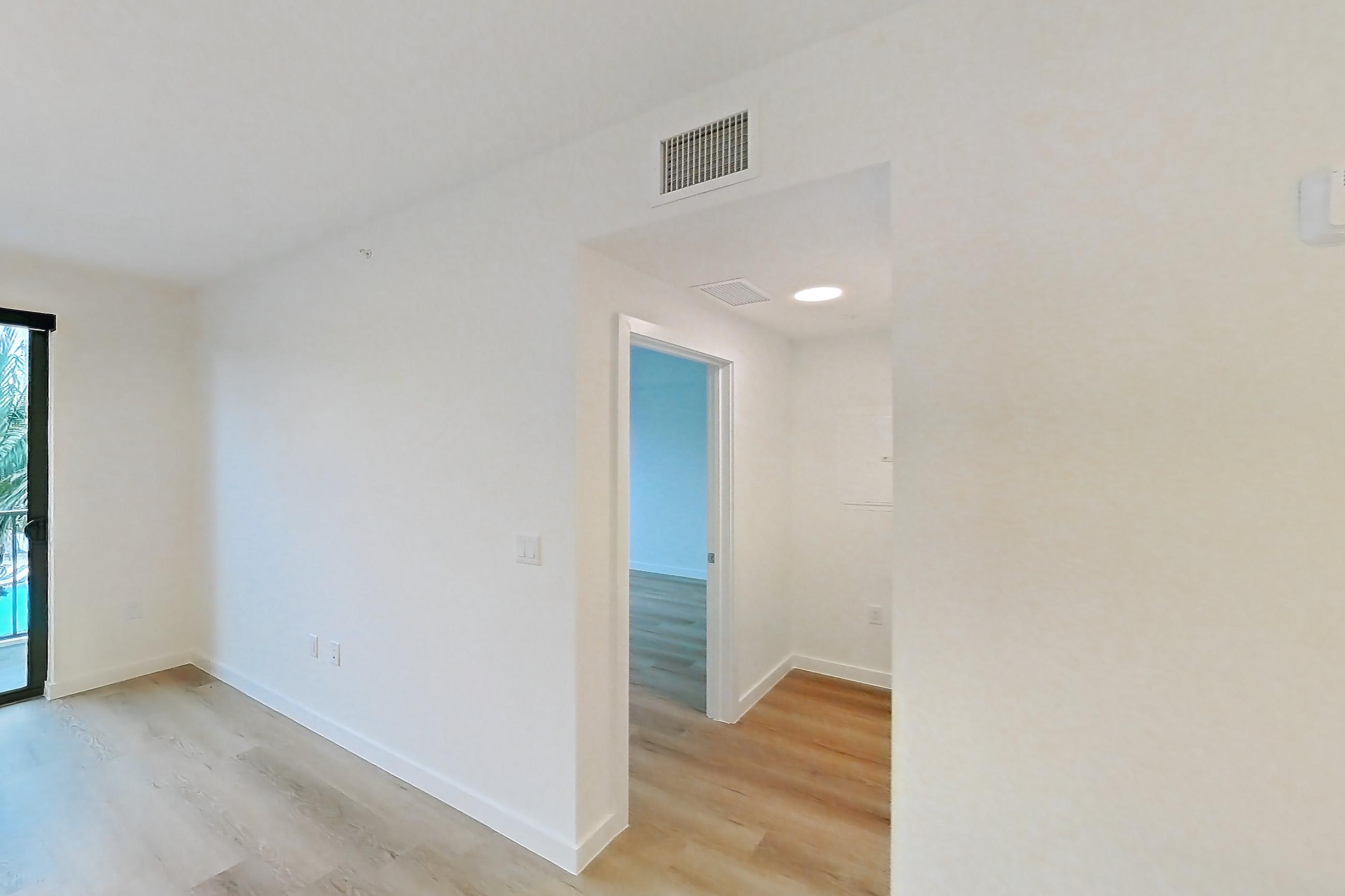 Kitchen island corner in Apartment 202 at Caroline Pompano Beach, A1 floor plan