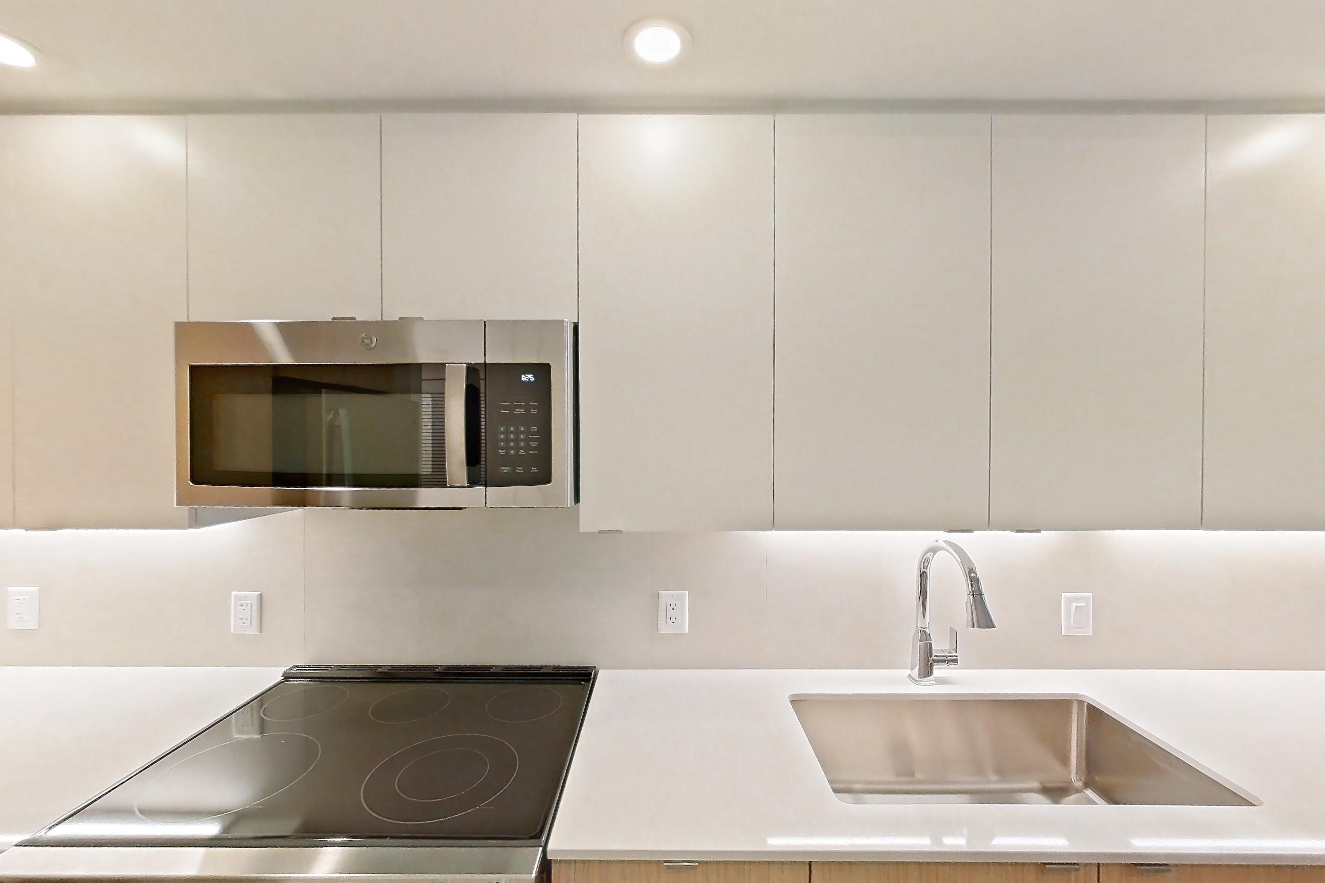 Kitchen in Apartment 202 at Caroline Pompano Beach, A1 floor plan