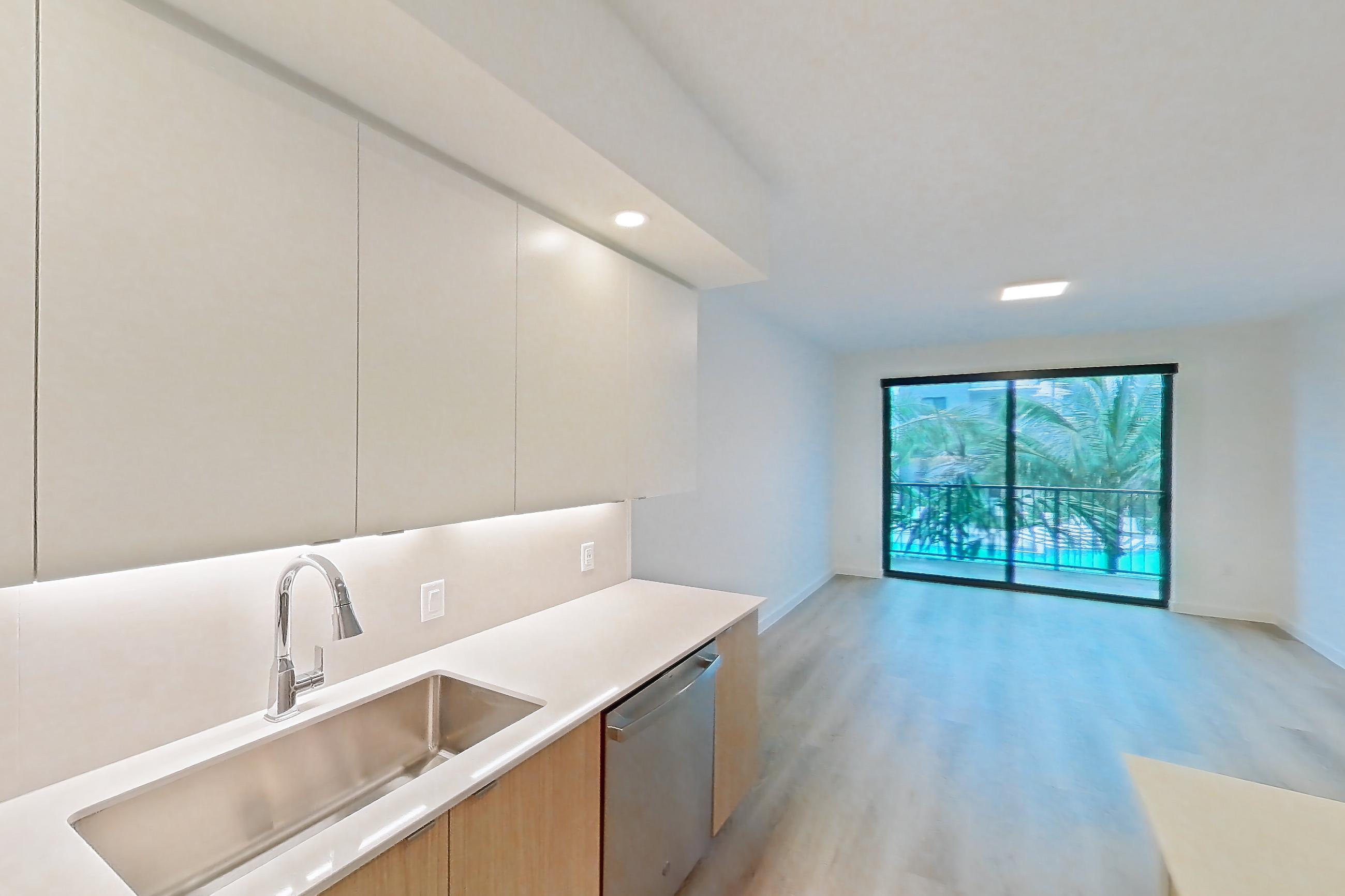 Kitchen in Apartment 202 at Caroline Pompano Beach, A1 floor plan