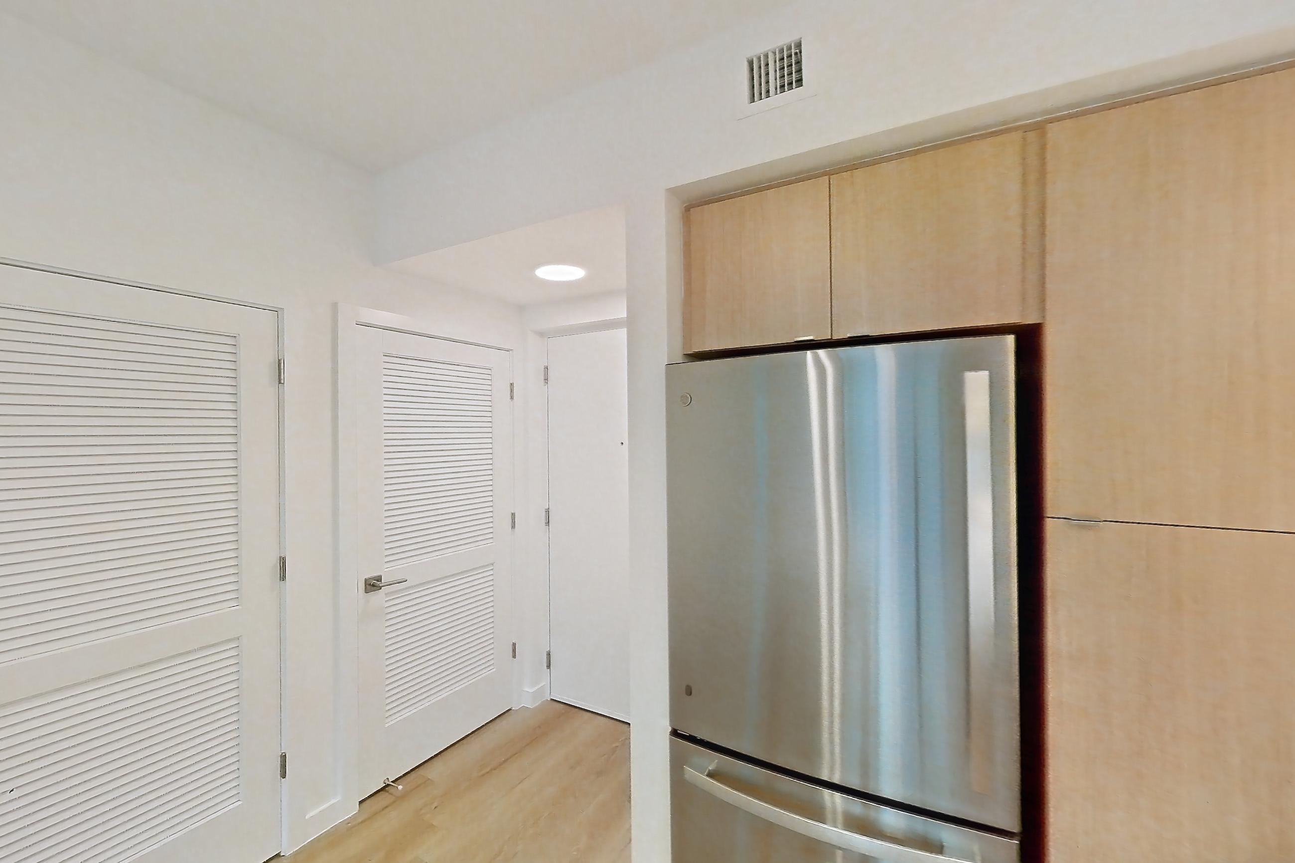 Kitchen in Apartment 202 at Caroline Pompano Beach, A1 floor plan