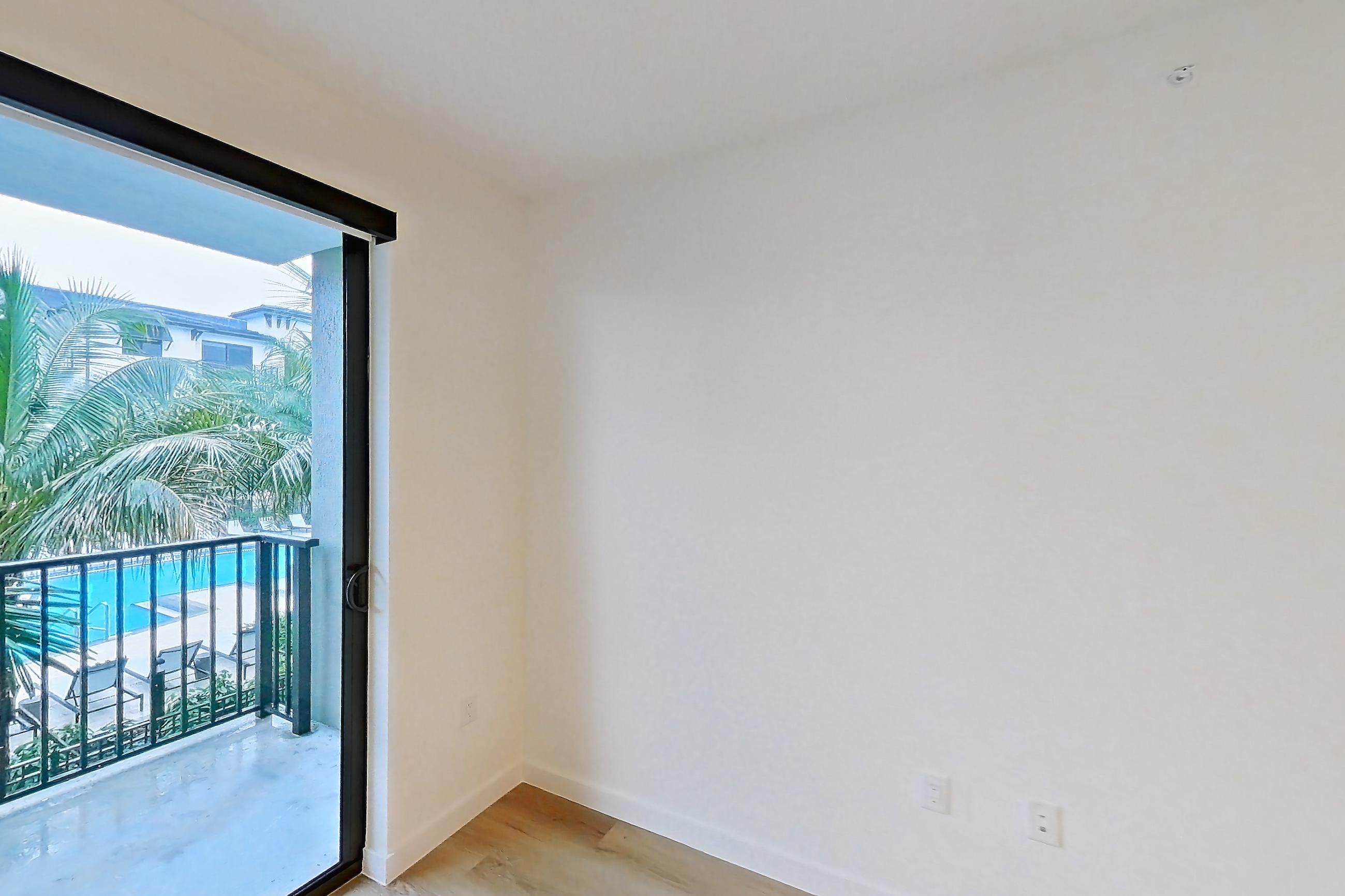Living room in Apartment 202 at Caroline Pompano Beach, A1 floor plan
