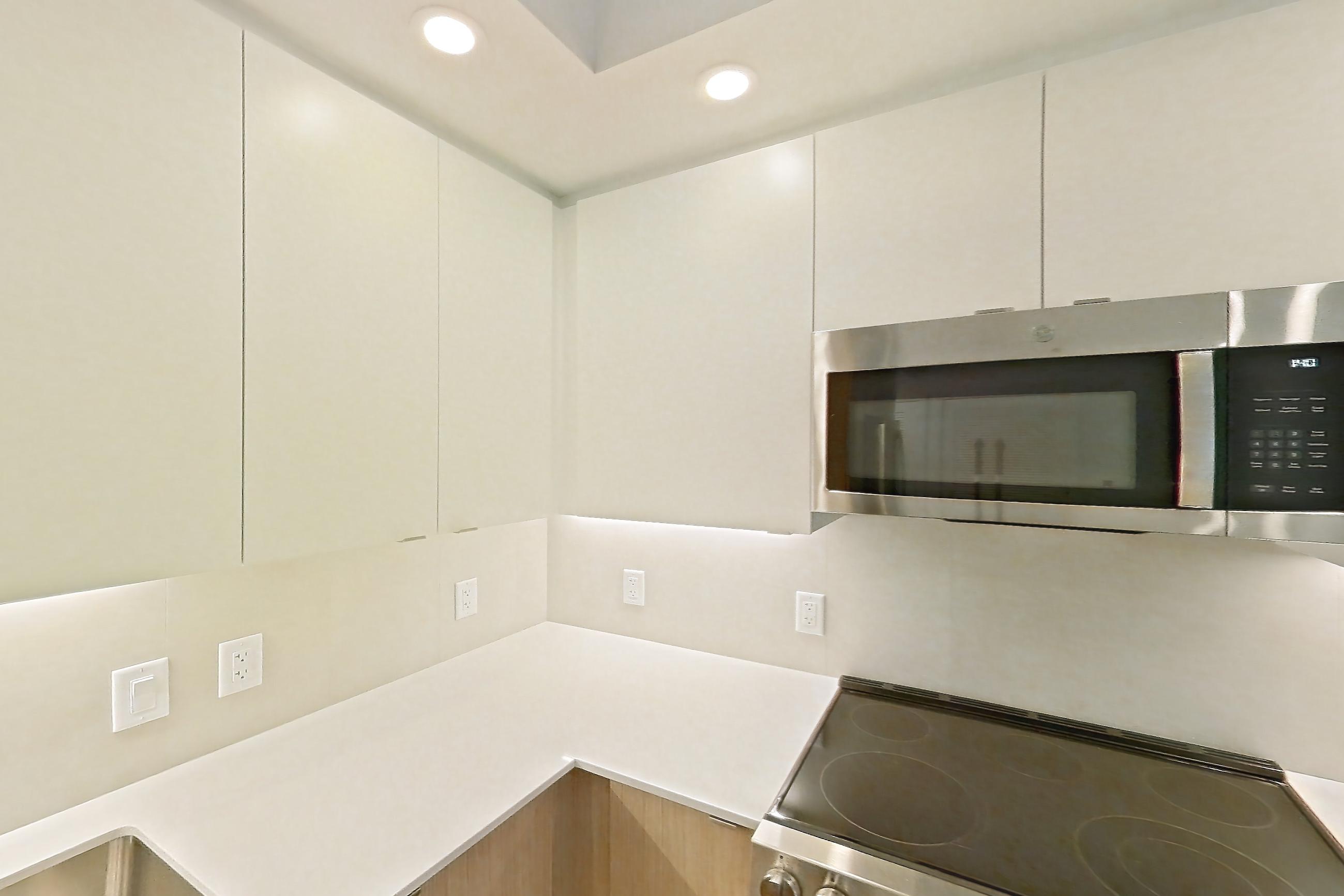 Kitchen in Apartment 203 at Caroline Pompano Beach, B1 floor plan