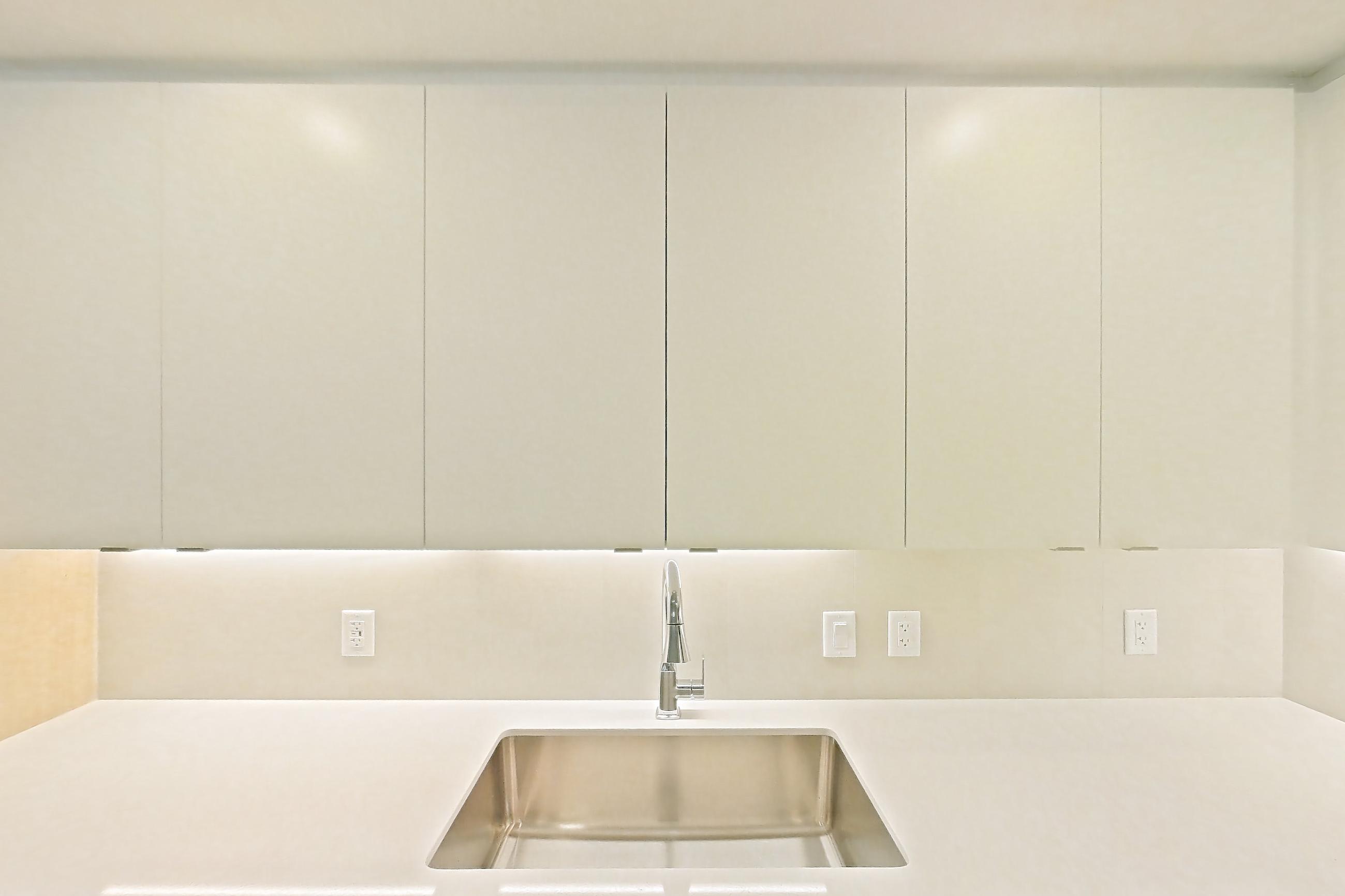 Kitchen in Apartment 203 at Caroline Pompano Beach, B1 floor plan
